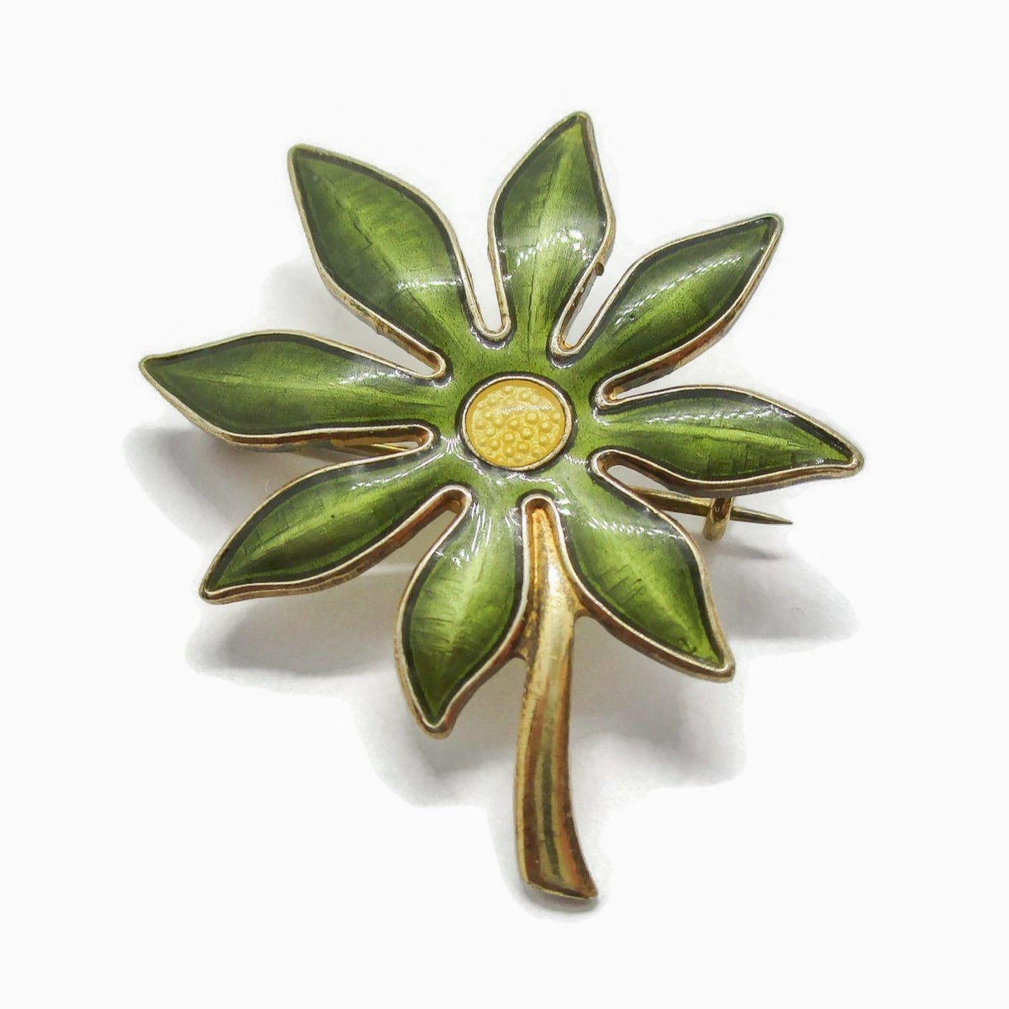 Aksel Holmsen sterling silver and bright green enamel daisy brooch close up 