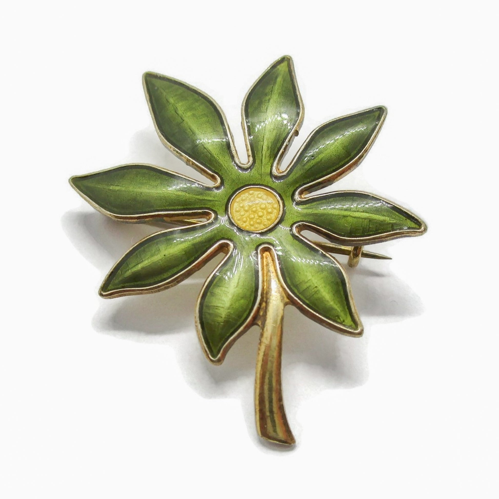 Aksel Holmsen sterling silver and bright green enamel daisy brooch close up 