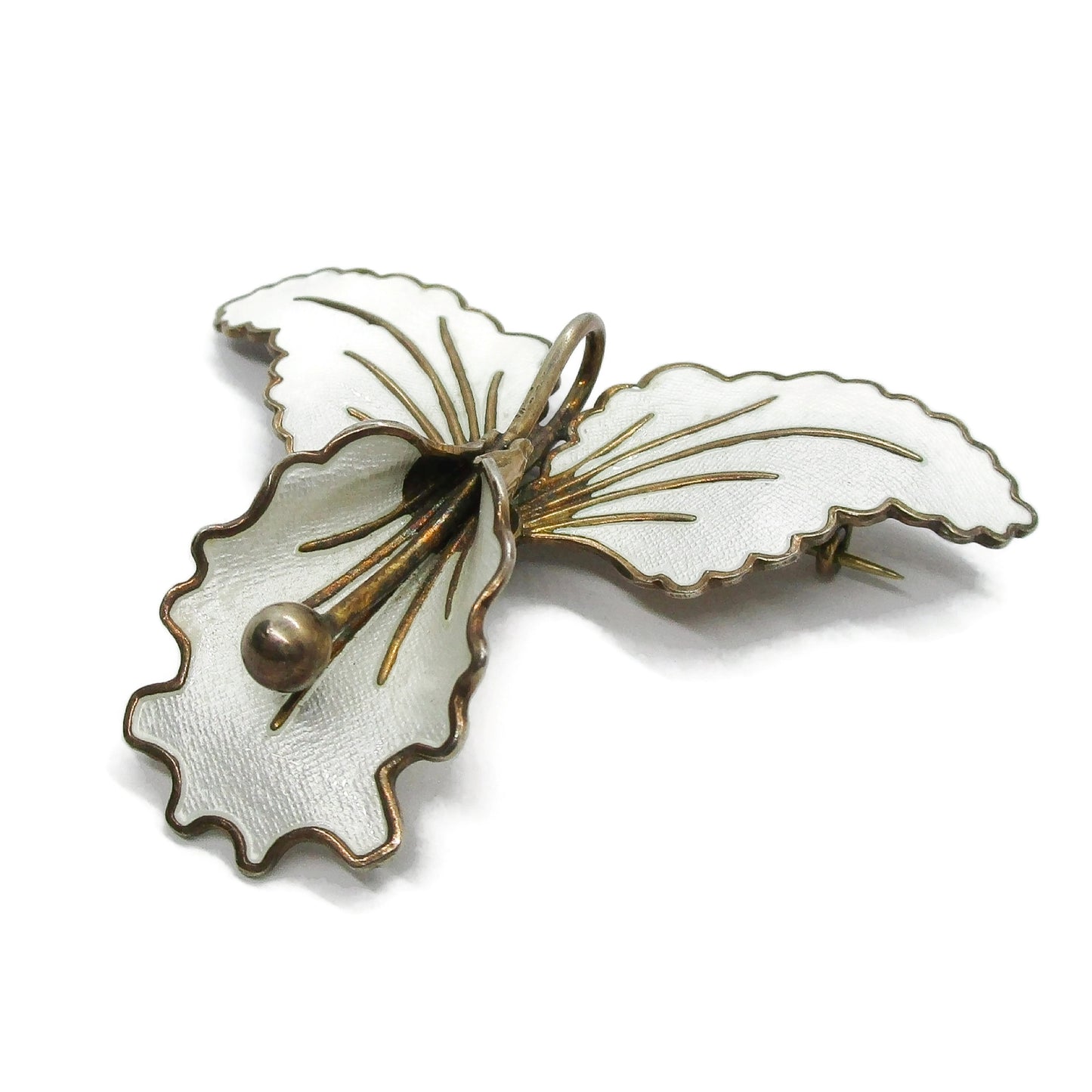 Aksel Holmsen Norway sterling silver gilt and white enamel orchid brooch shown on an angle