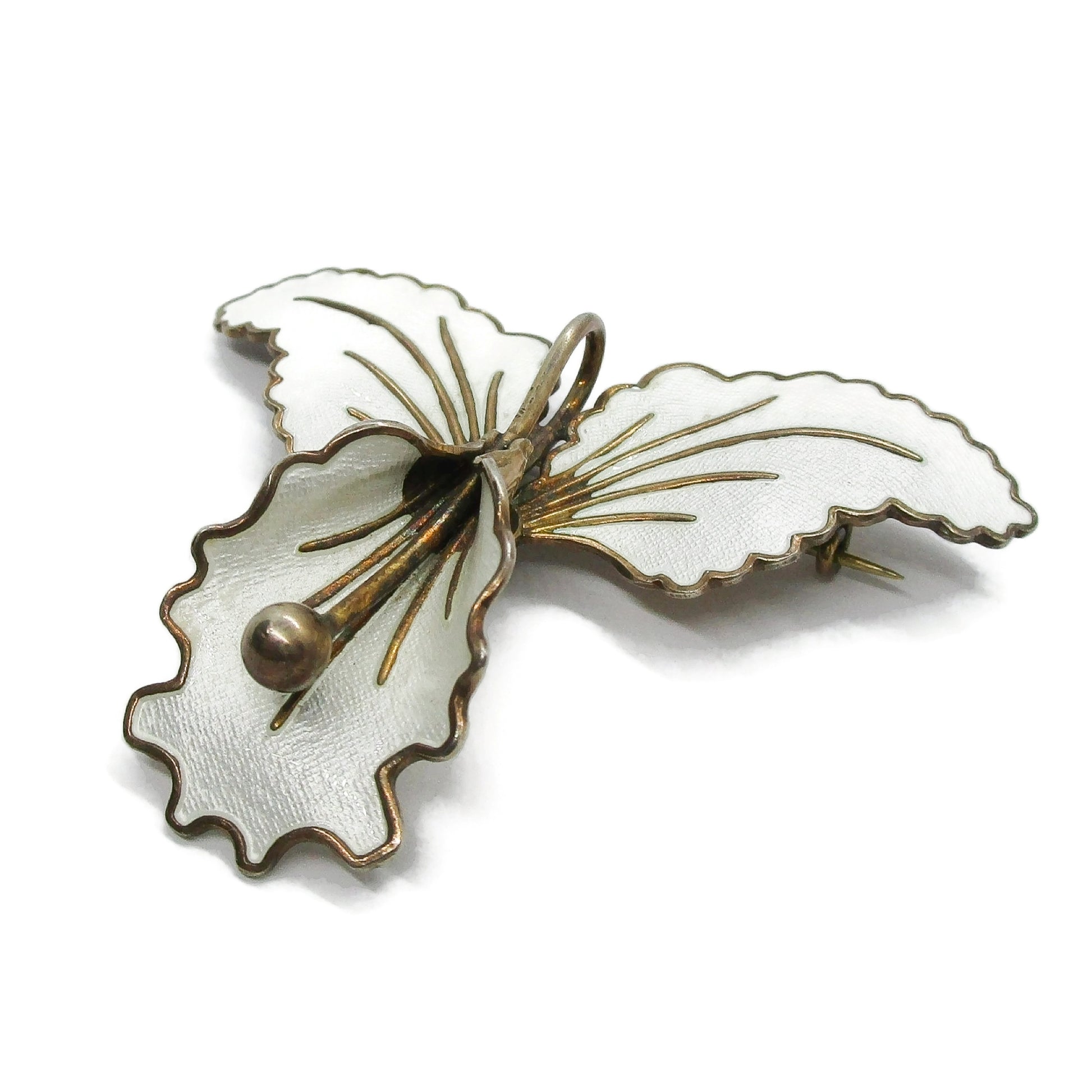 Aksel Holmsen Norway sterling silver gilt and white enamel orchid brooch shown on an angle