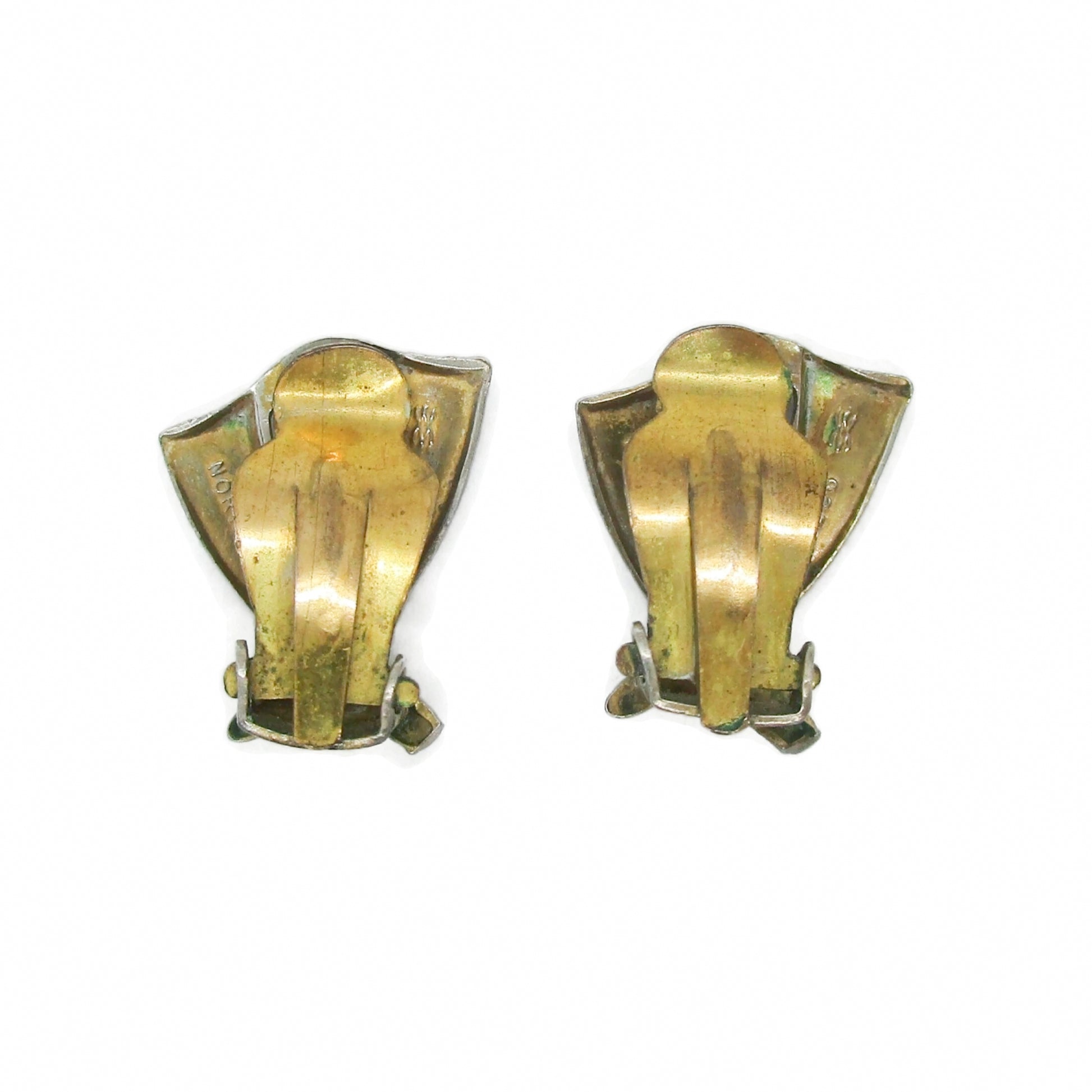 Back view of a pair of Aksel Holmsen Norway sterling silver and enamel clip on earrings in a cross design