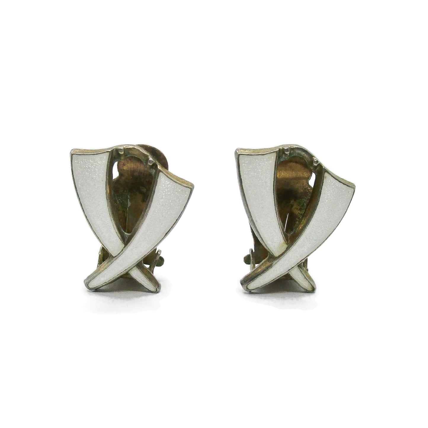 Front view of a pair of Aksel Holmsen Norway sterling silver and enamel clip on earrings in a cross design