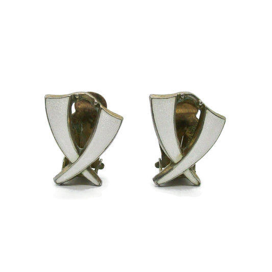 Front view of a pair of Aksel Holmsen Norway sterling silver and enamel clip on earrings in a cross design