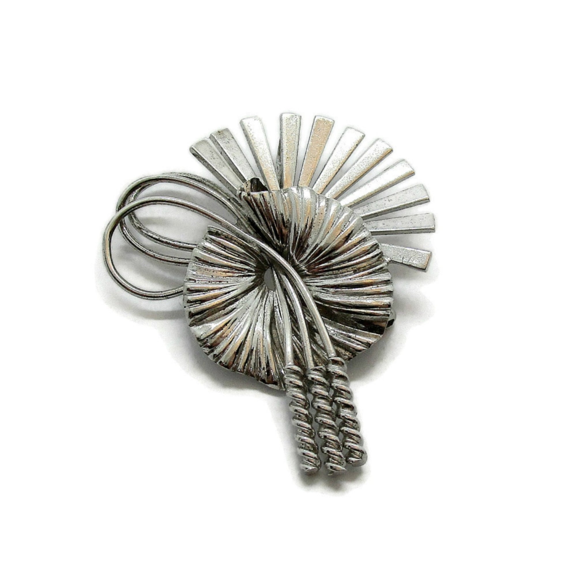Vintage Carl Art USA sterling silver brooch viewed from the side