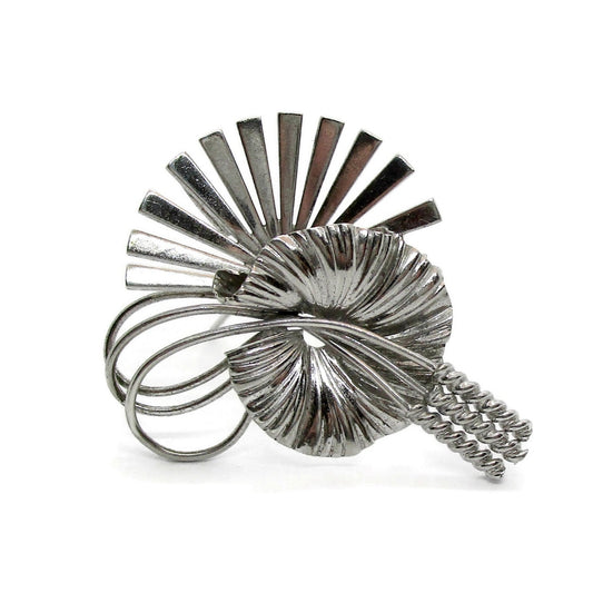 Front view of a brooch by Carl Art, USA in sterling silver on a white background