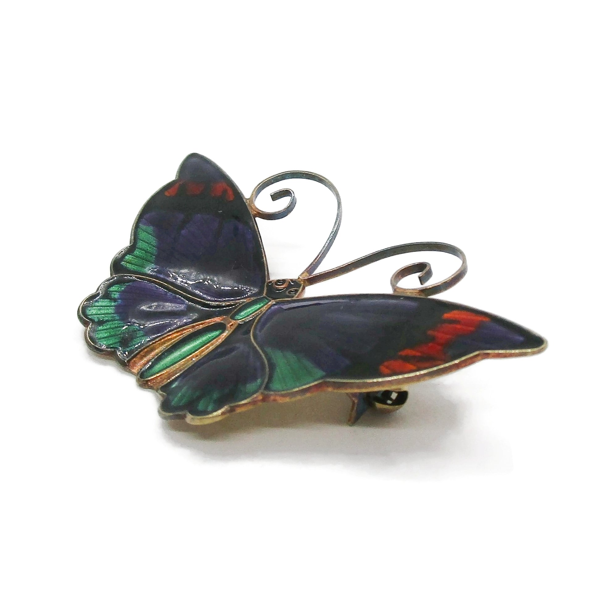Large David Andersen purple enamel butterfly brooch shown on its side