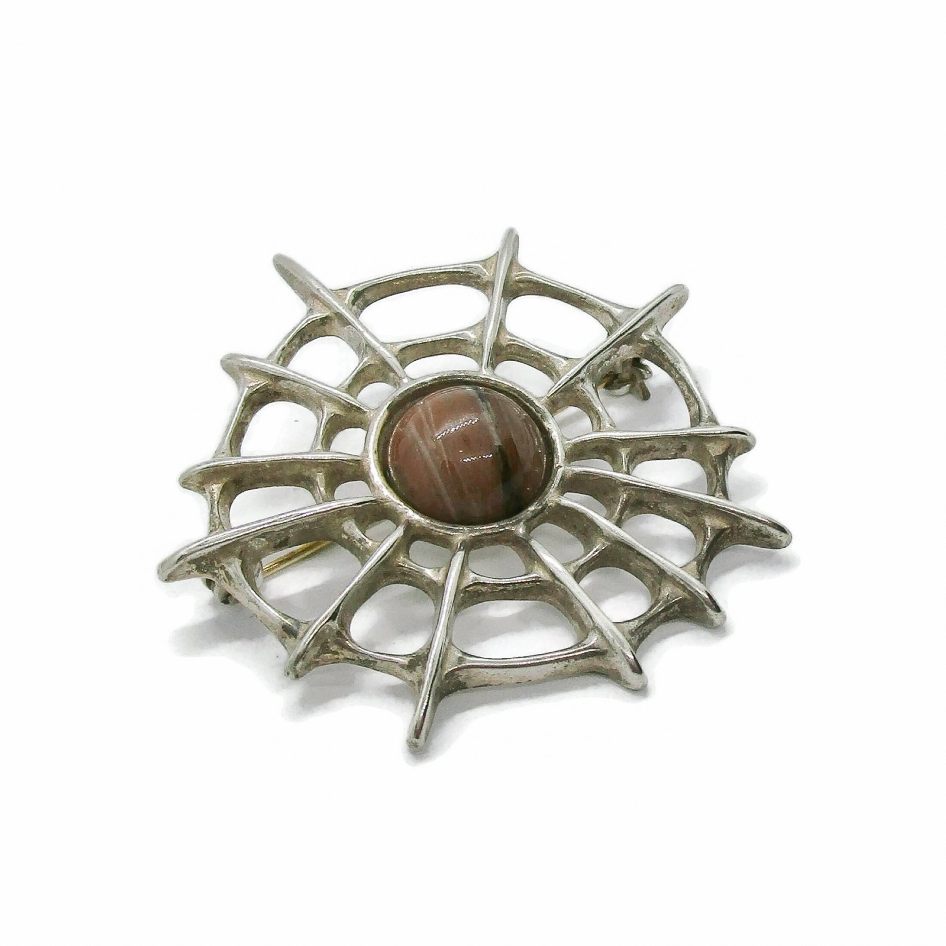 Front view of David Andersen Norway sterling silver and thulite Troll series spiderweb brooch