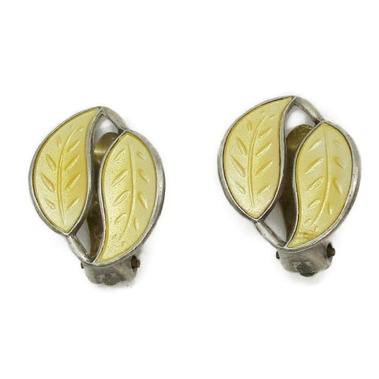 Front view of a pair of David Andersen Norway small yellow enamel double leaf clip on earrings