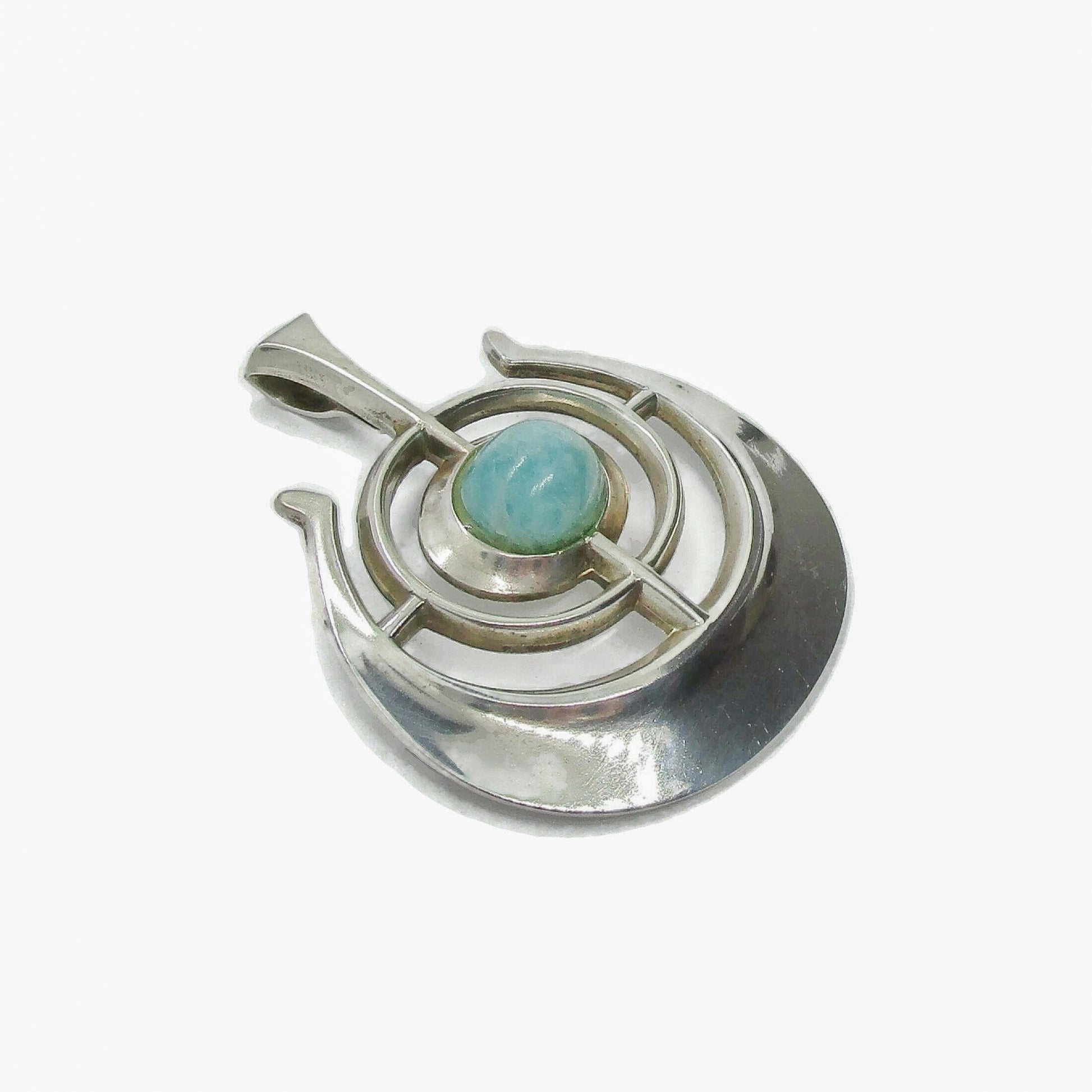Angled view of a David Andersen Norway sterling silver and amazonite "Ship of Good Fortune" pendant from the Troll series