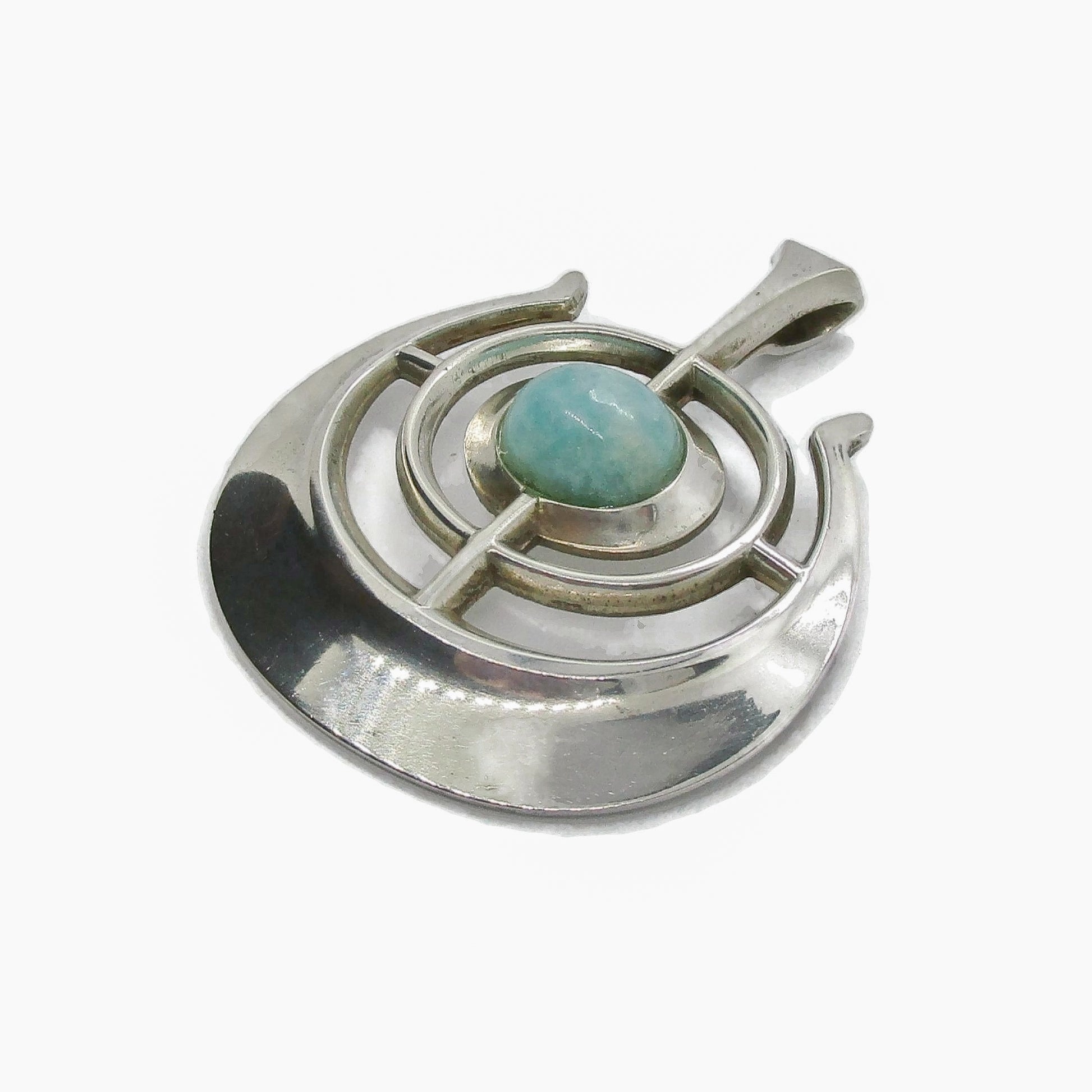 Close up view of a David Andersen Norway sterling silver and amazonite "Ship of Good Fortune" pendant from the Troll series