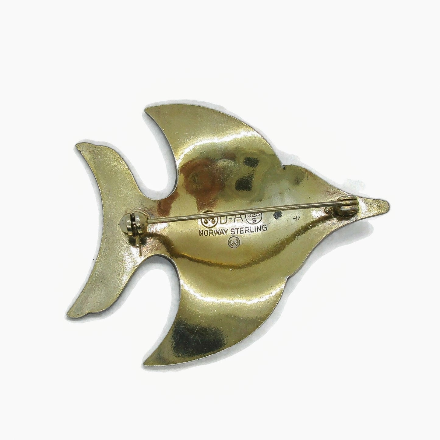 Back view of a David Andersen sterling silver gilt and enamel angel fish brooch showing hallmarks