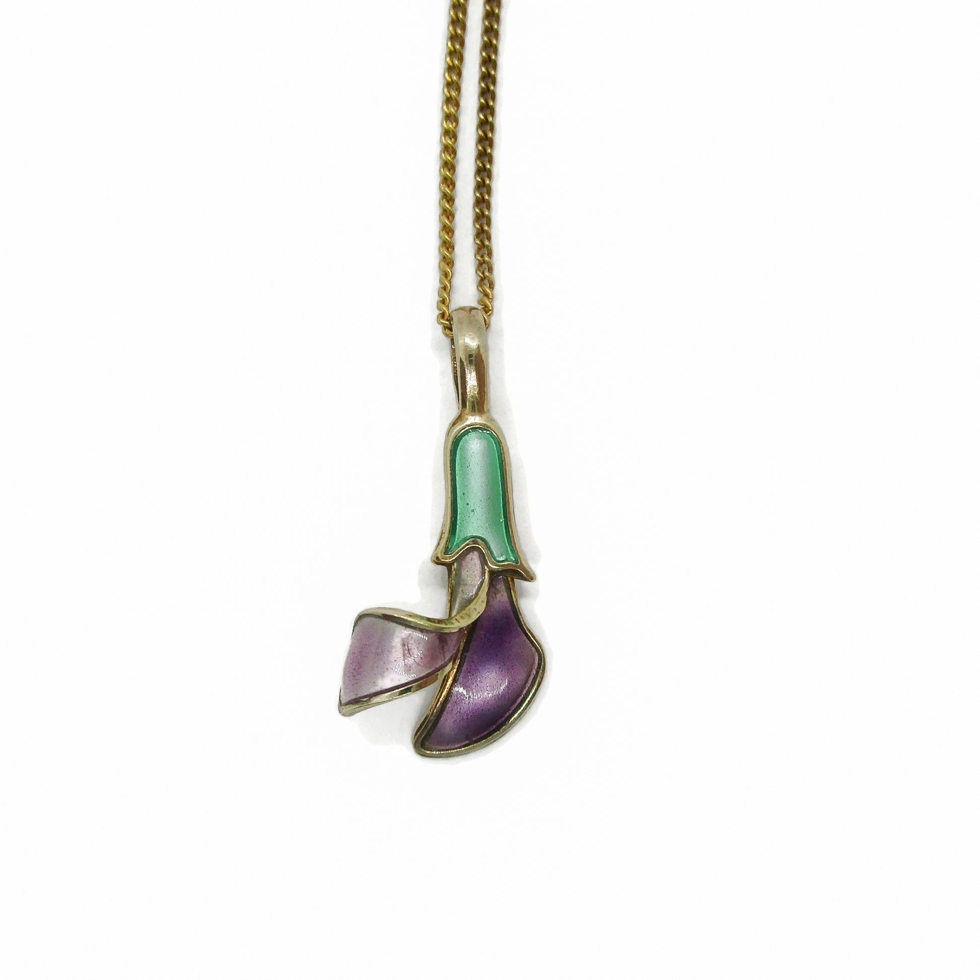 Front view of a David Andersen Norway sterling silver gilt and enamel flower pendant on a gold coloured chain
