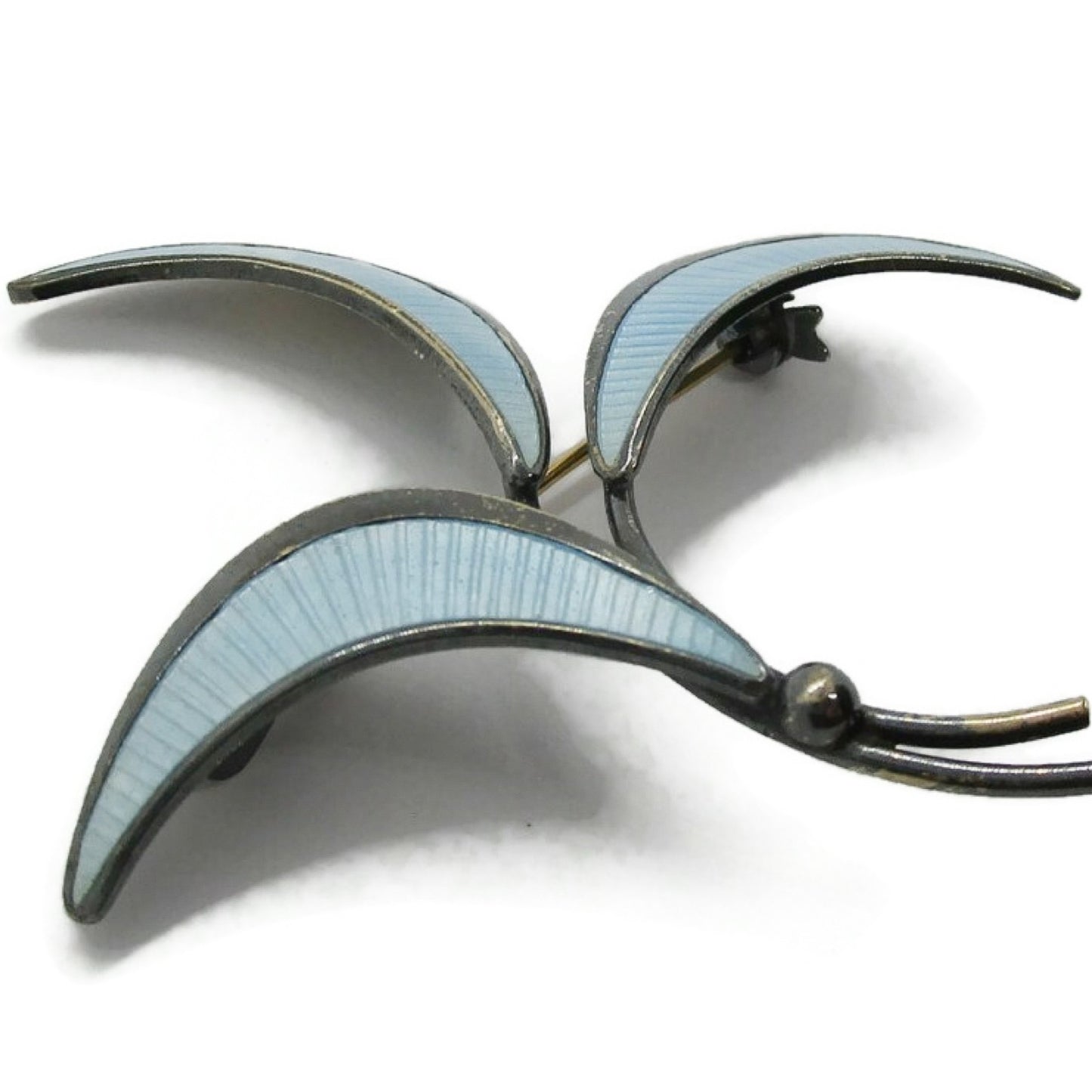 E Dragsted Denmark blue enamel and sterling silver brooch close up