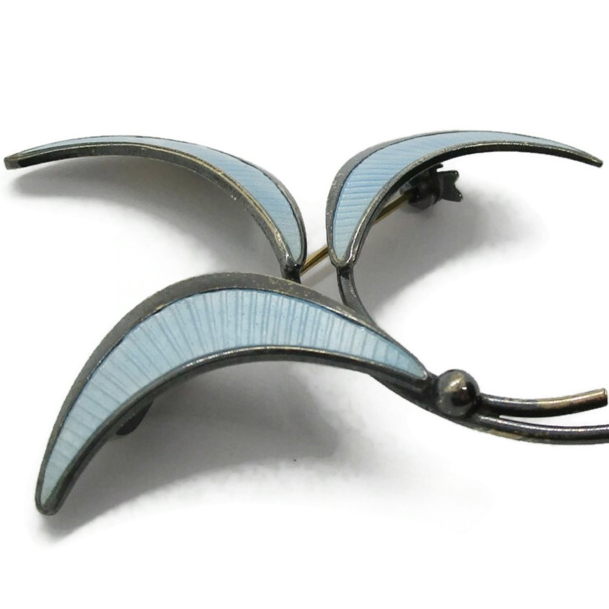 E Dragsted Denmark blue enamel and sterling silver brooch close up