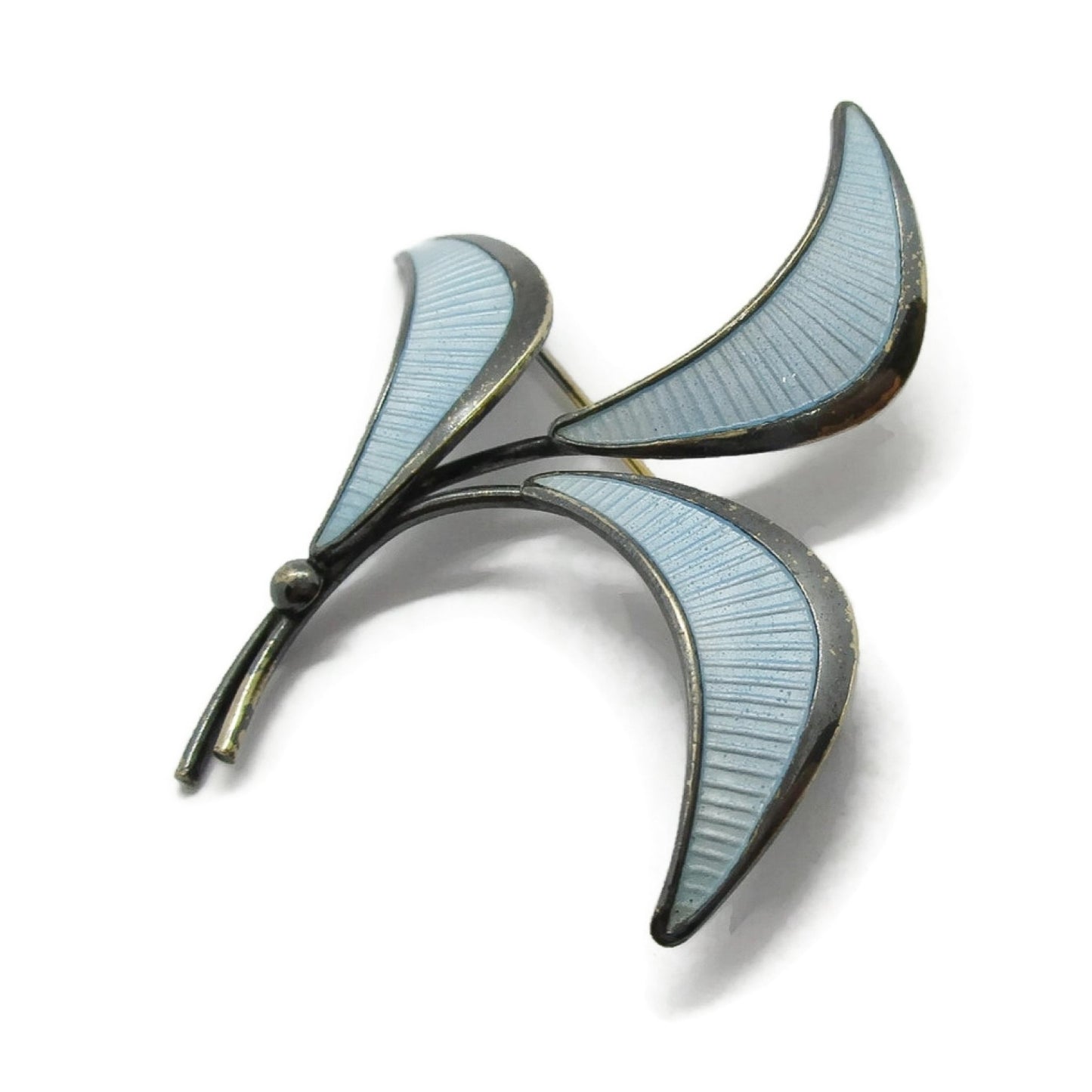 E Dragsted Denmark blue enamel and sterling silver brooch shown on its side