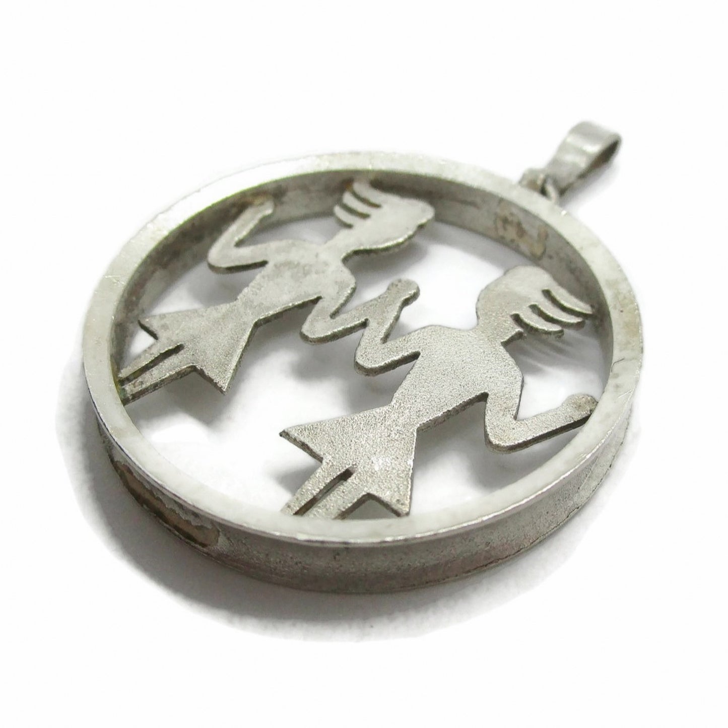 Angled view of Franz Breuer Gemini sterling silver Gemini pendant
