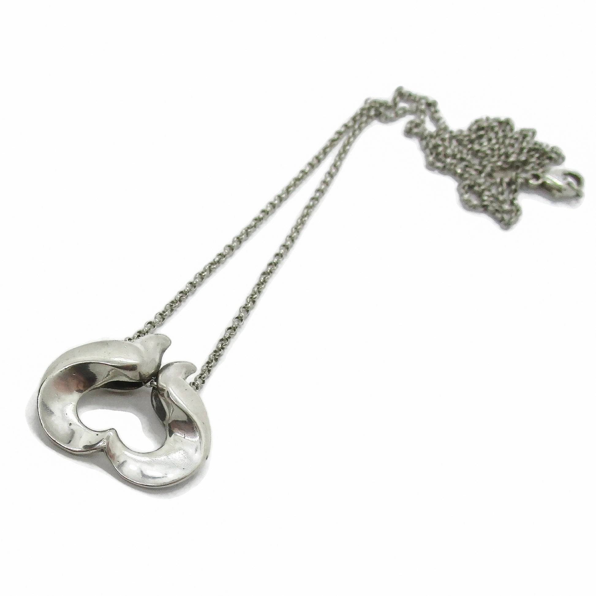Front view of a Georg Jensen sterling silver pendant of the year for 1995 designed by Allan Scharff