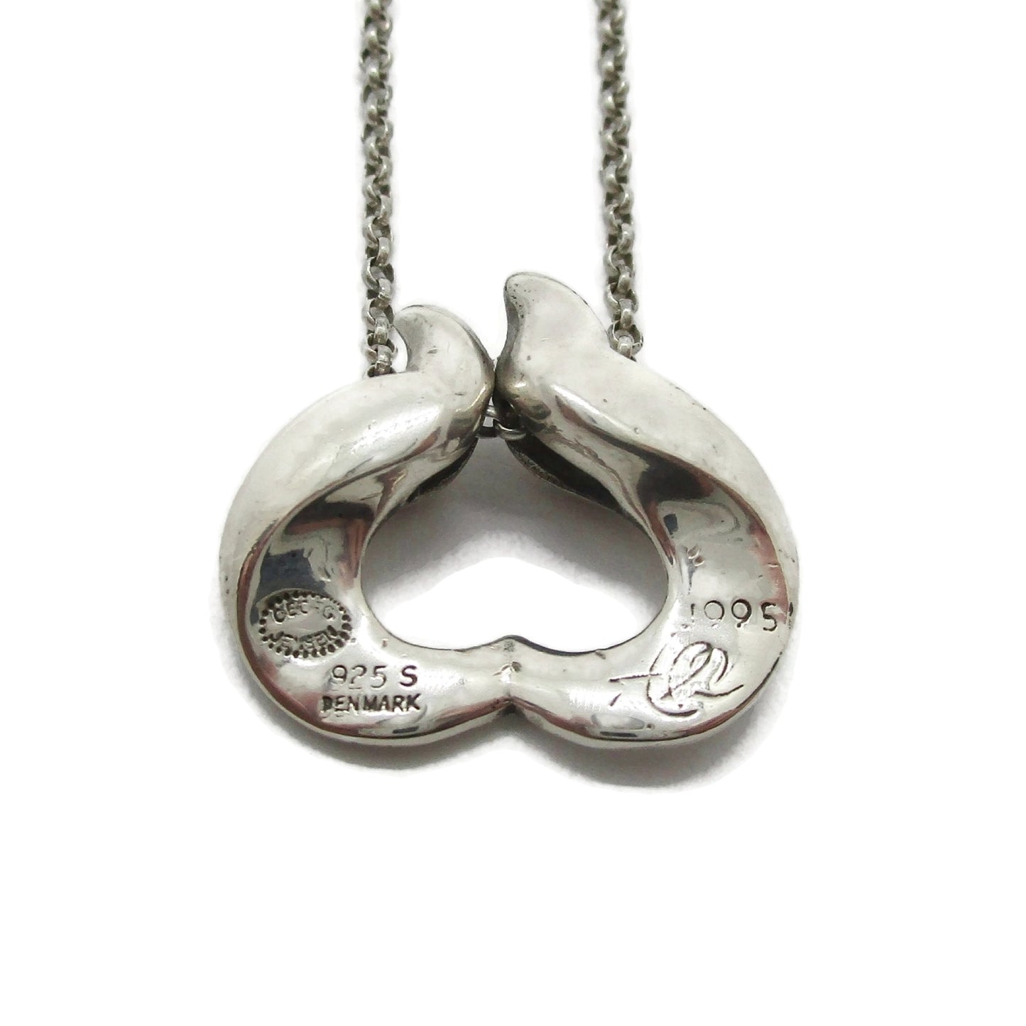 Back view of a Georg Jensen sterling silver pendant of the year for 1995 designed by Allan Scharff