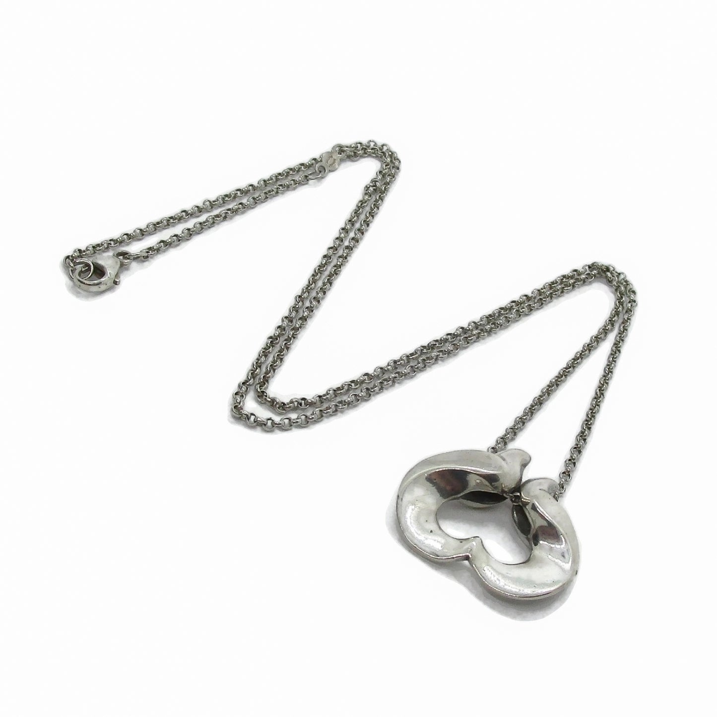 A Georg Jensen sterling silver pendant of the year for 1995 designed by Allan Scharff with chain