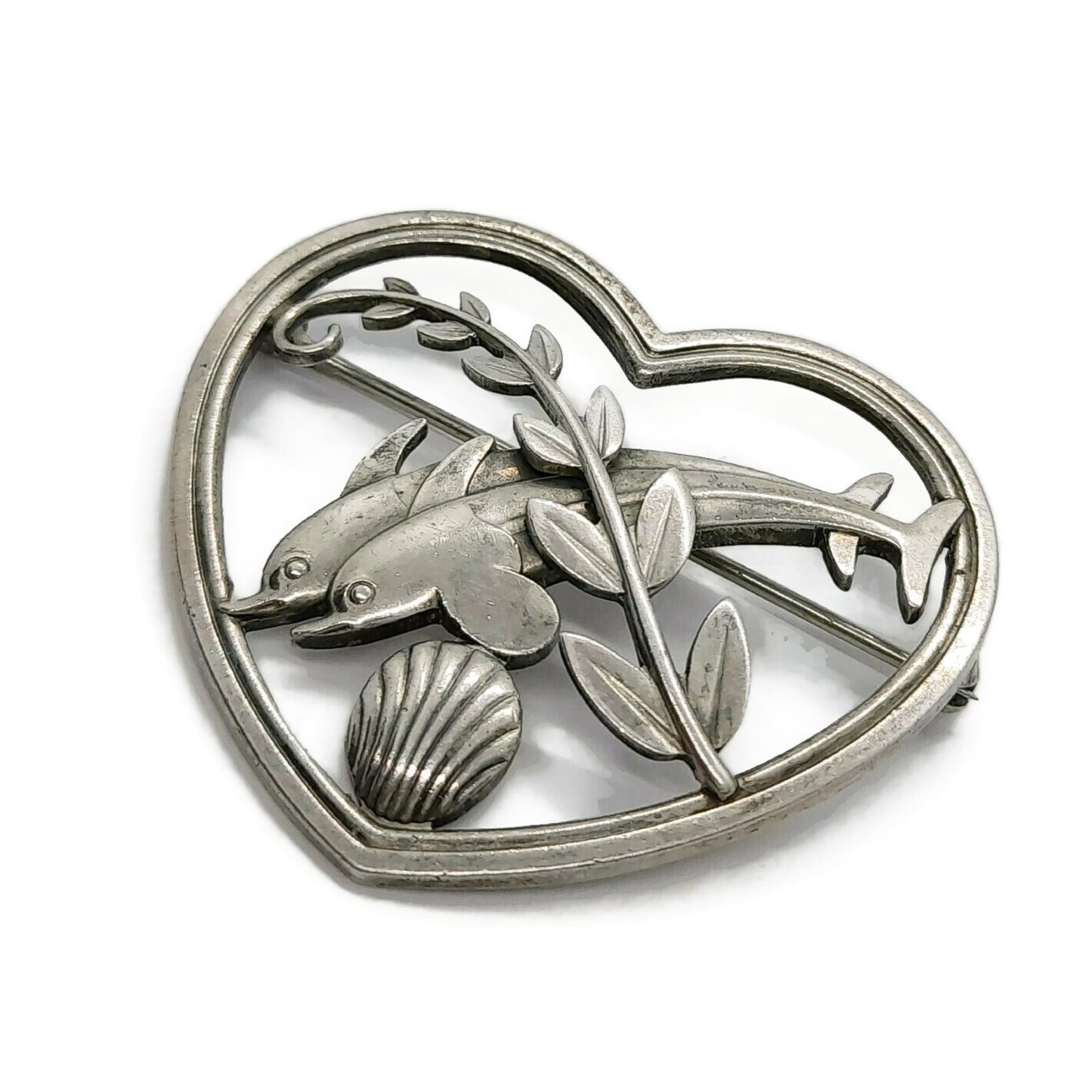 Georg Jensen sterling silver brooch with heart design featuring a dolphin, shell, and leaf number 312