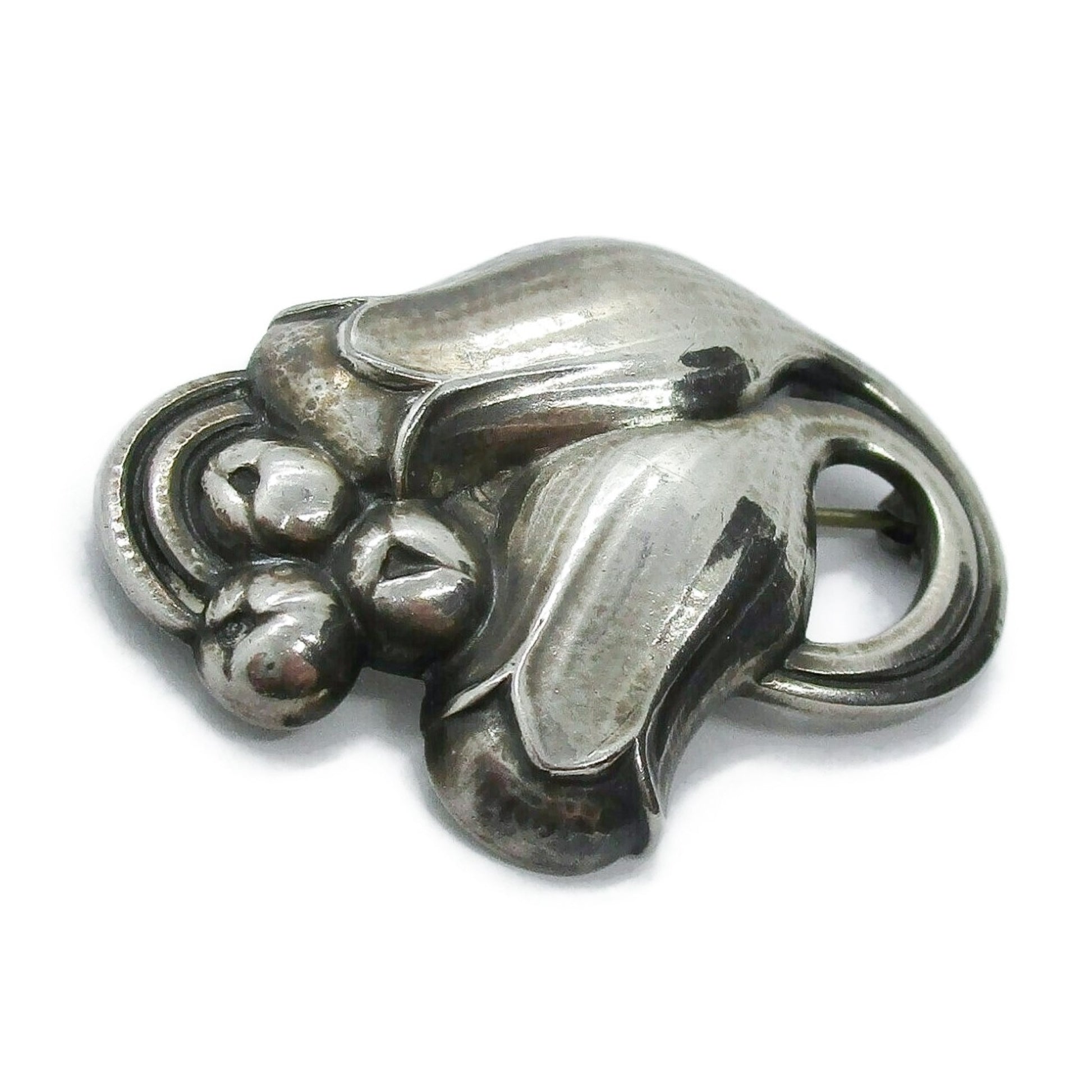 Angled view of Georg Jensen sterling silver tulip brooch number 100B