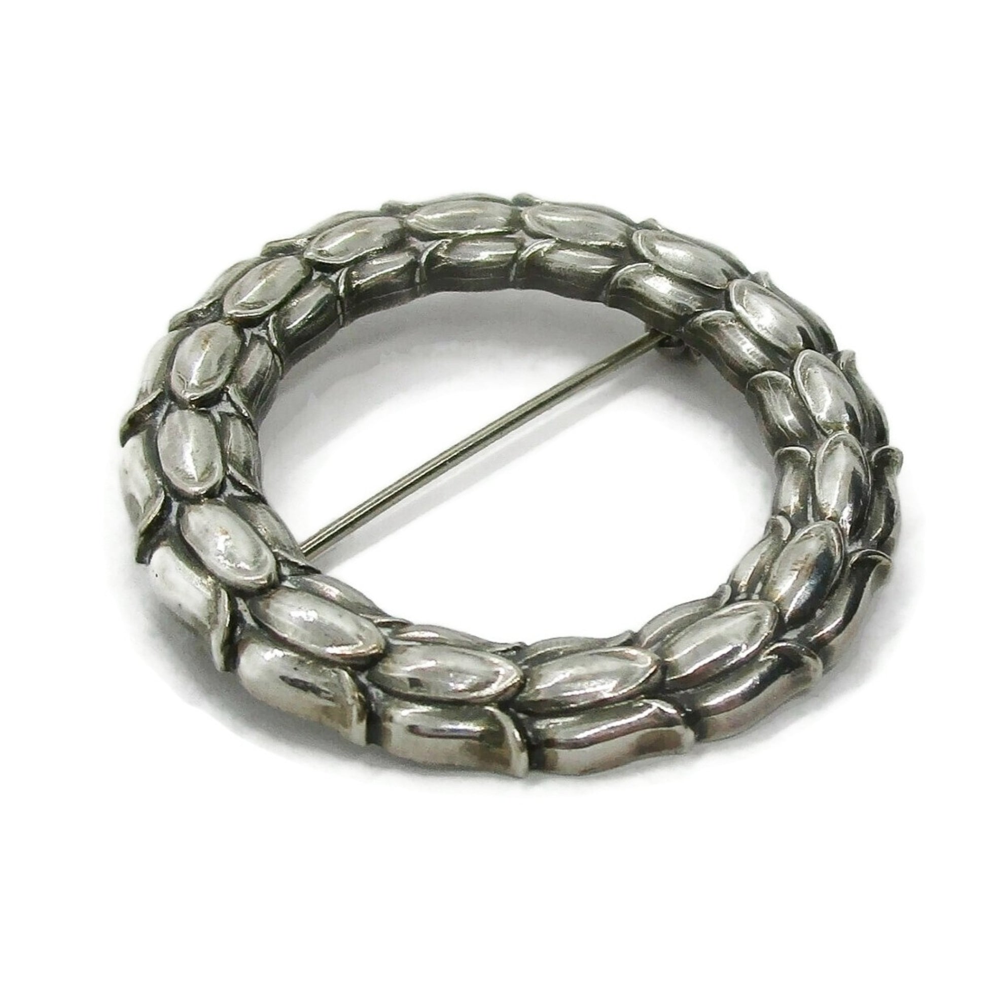 Angled view of Georg Jensen Denmark sterling silver wreath brooch number 301