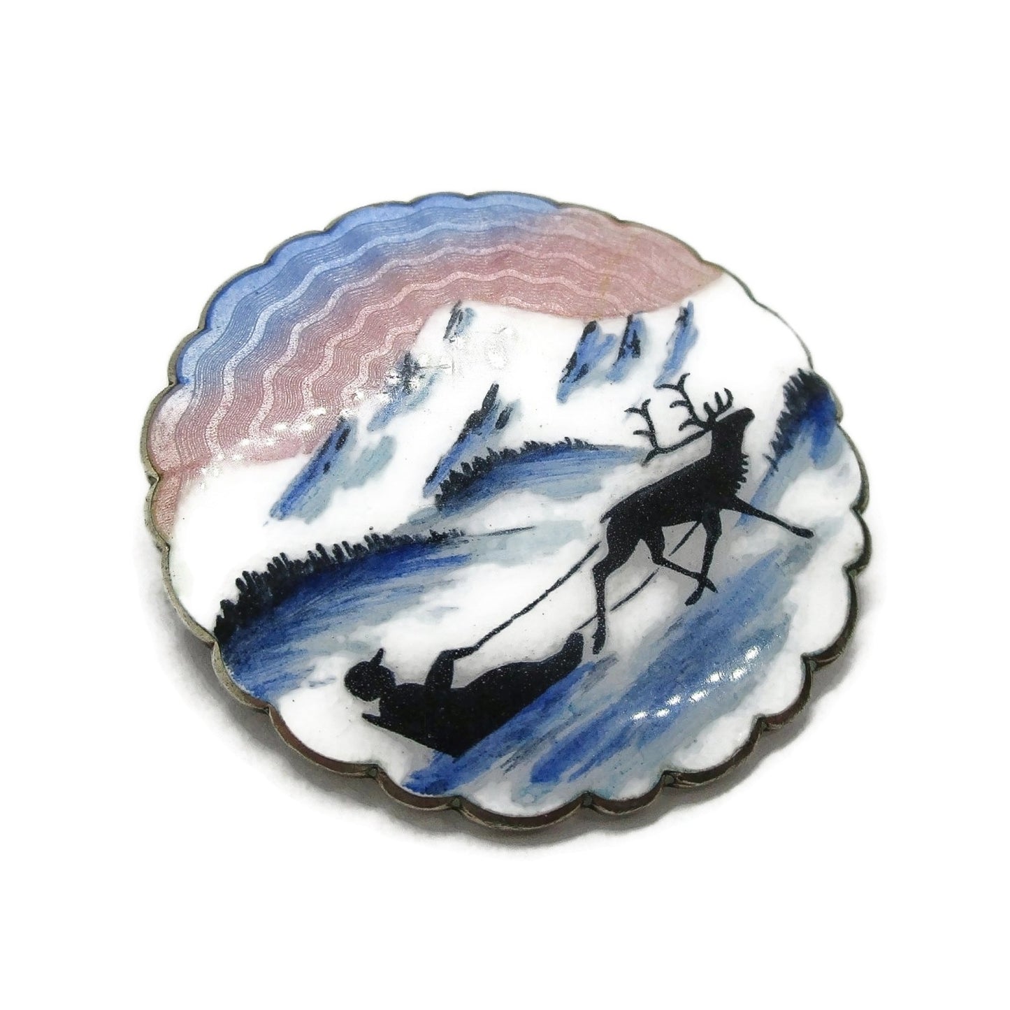 Large Ivar Holth sterling silver and enamel brooch showing man in sled pulled by reindeer front view on left diagonal