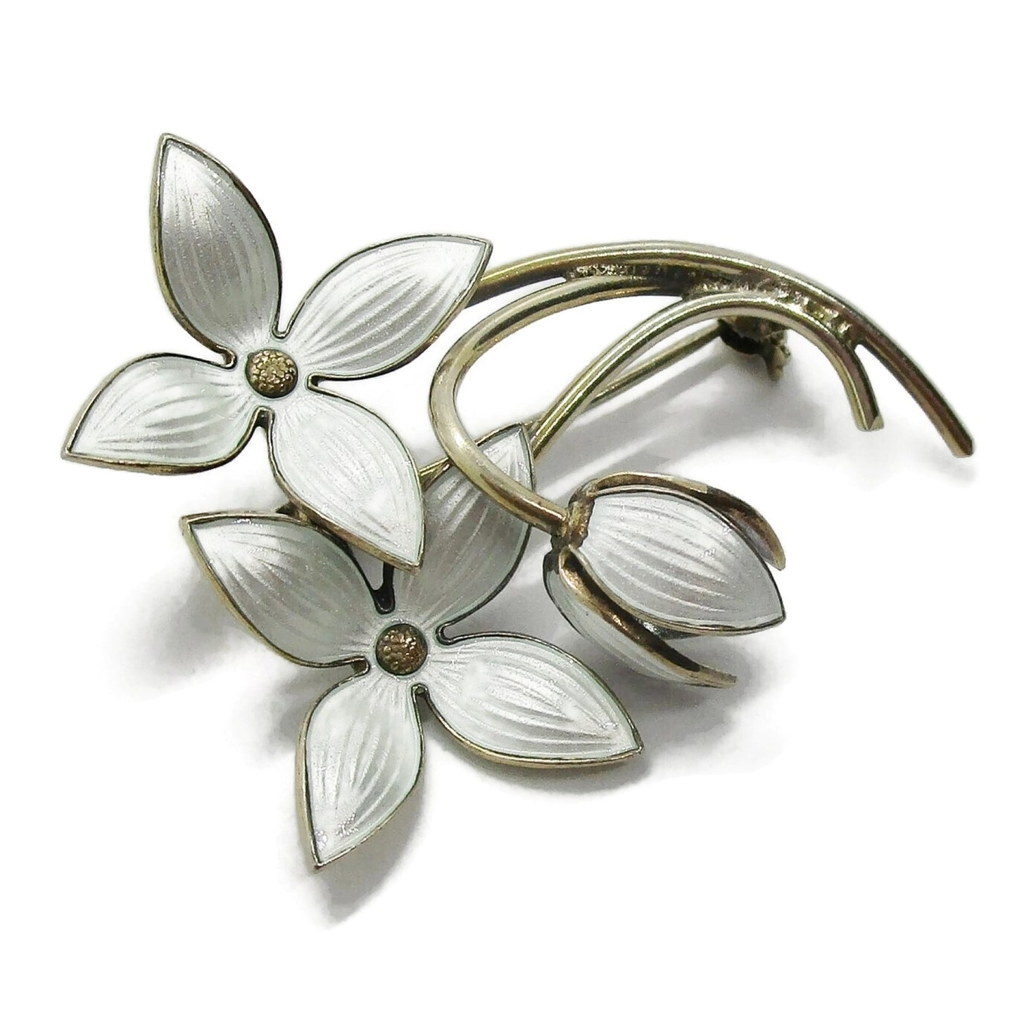 Ivar Holth Norway sterling silver gilt and white enamel flower spray brooch shown on an angle