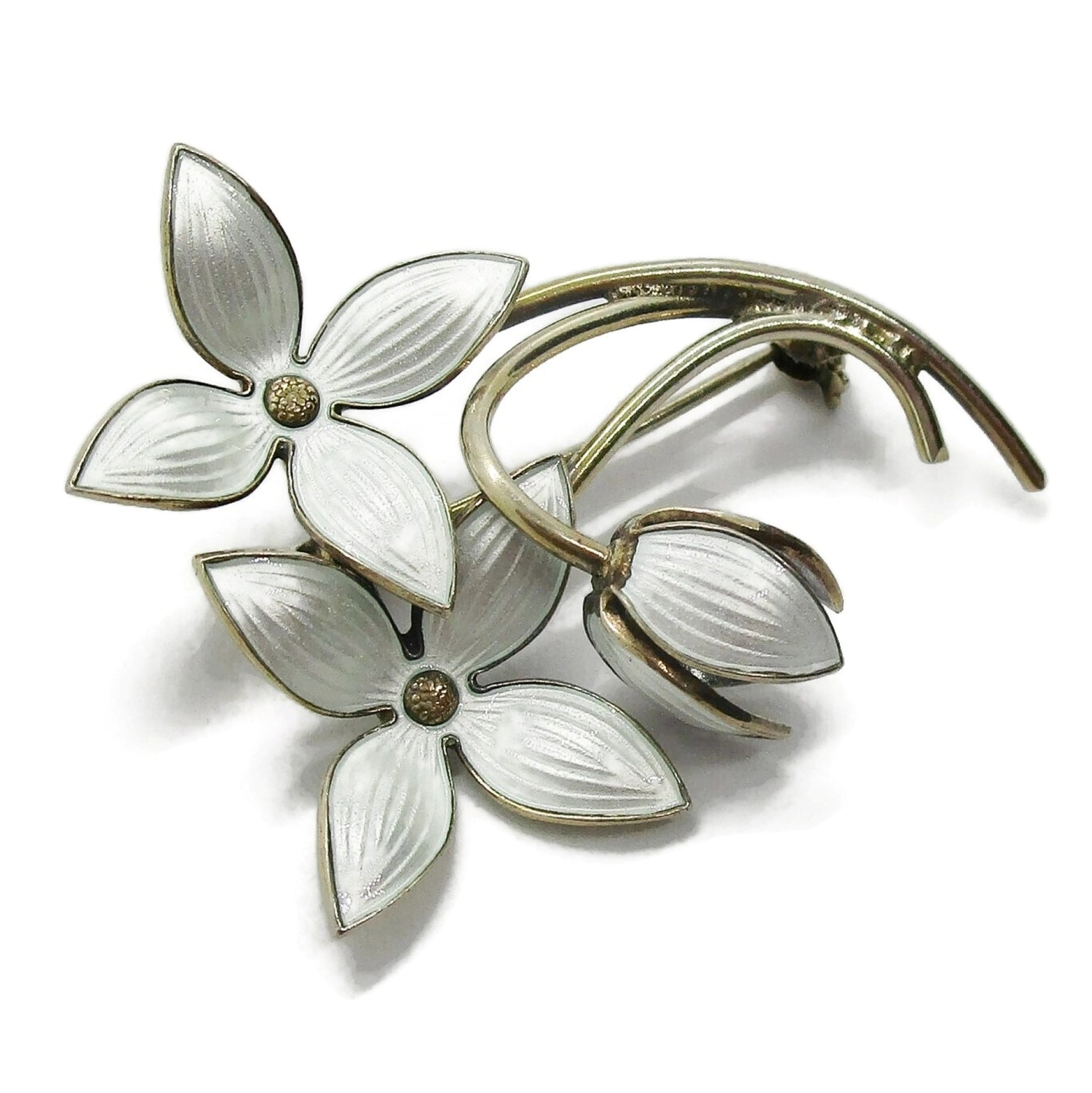Ivar Holth Norway sterling silver gilt and white enamel flower spray brooch shown on an angle