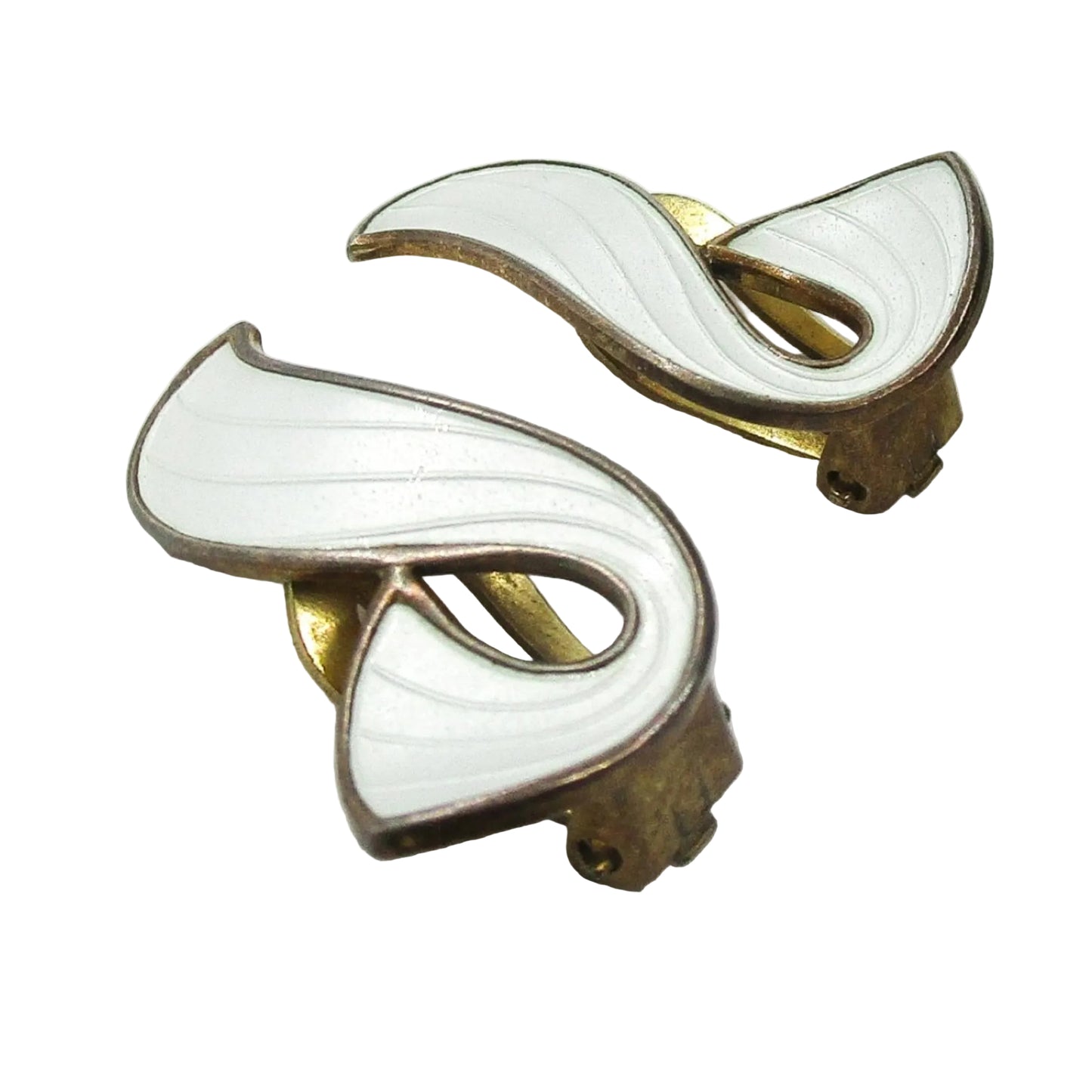 Angled view of a pair of Ivar Holth Norway clip on earrings in sterling silver gilt and white guilloche enamel