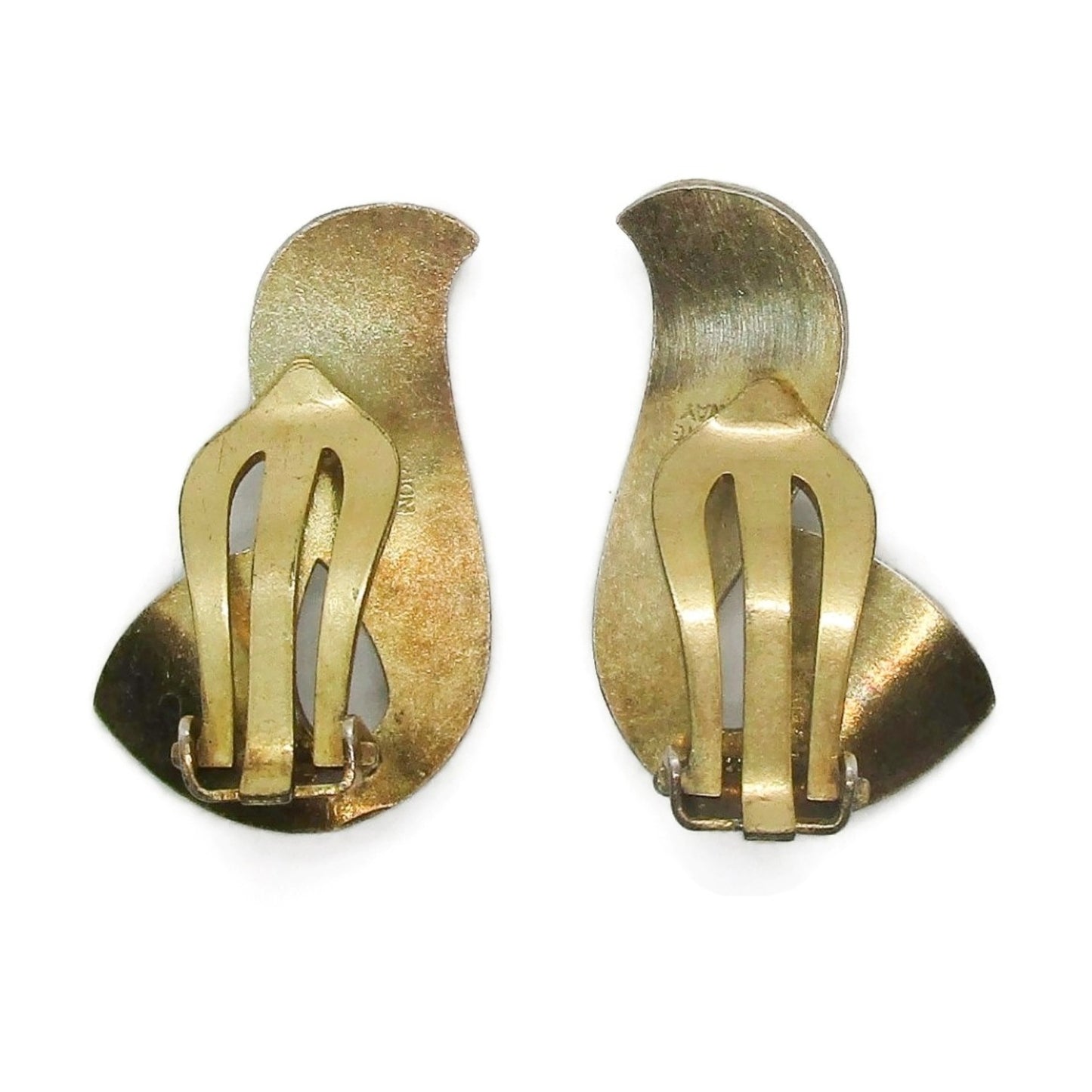 Back view of a pair of Ivar Holth Norway clip on earrings in sterling silver gilt and white guilloche enamel