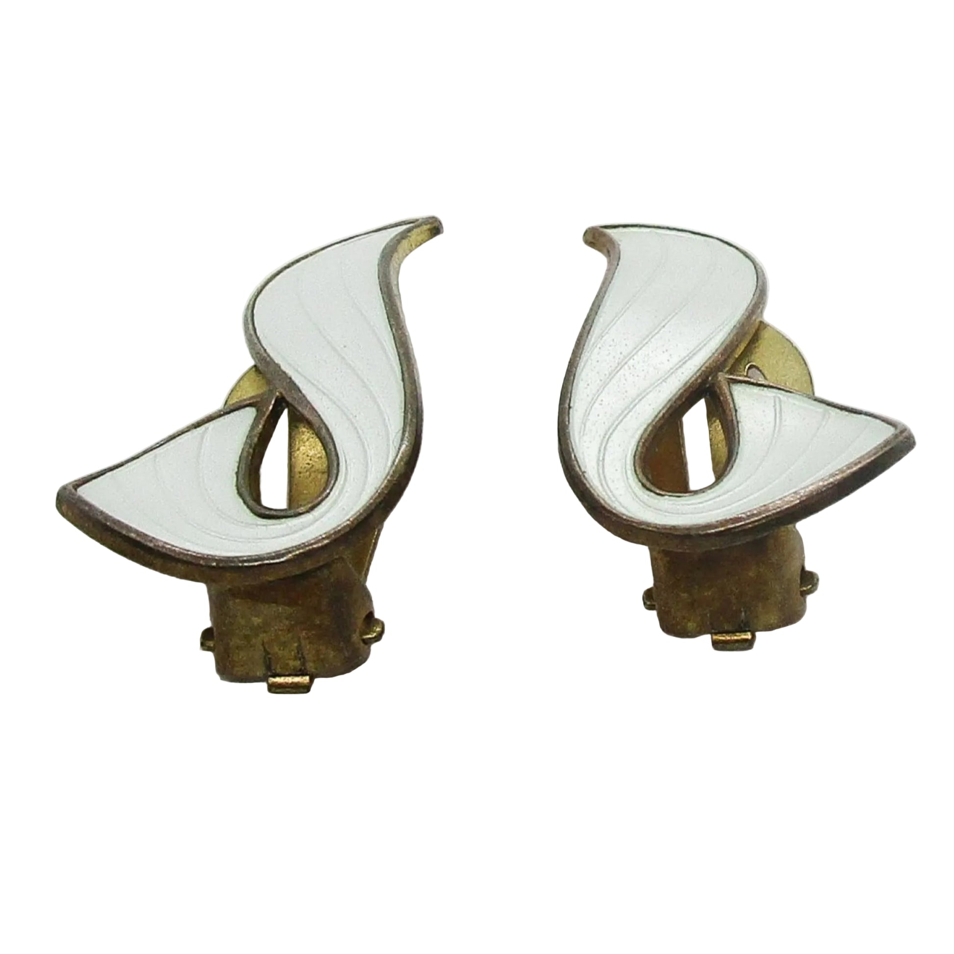 A pair of Ivar Holth Norway clip on earrings in sterling silver gilt and white guilloche enamel seen from the bottom