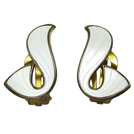 Front view of a pair of Ivar Holth Norway clip on earrings in sterling silver gilt and white guilloche enamel