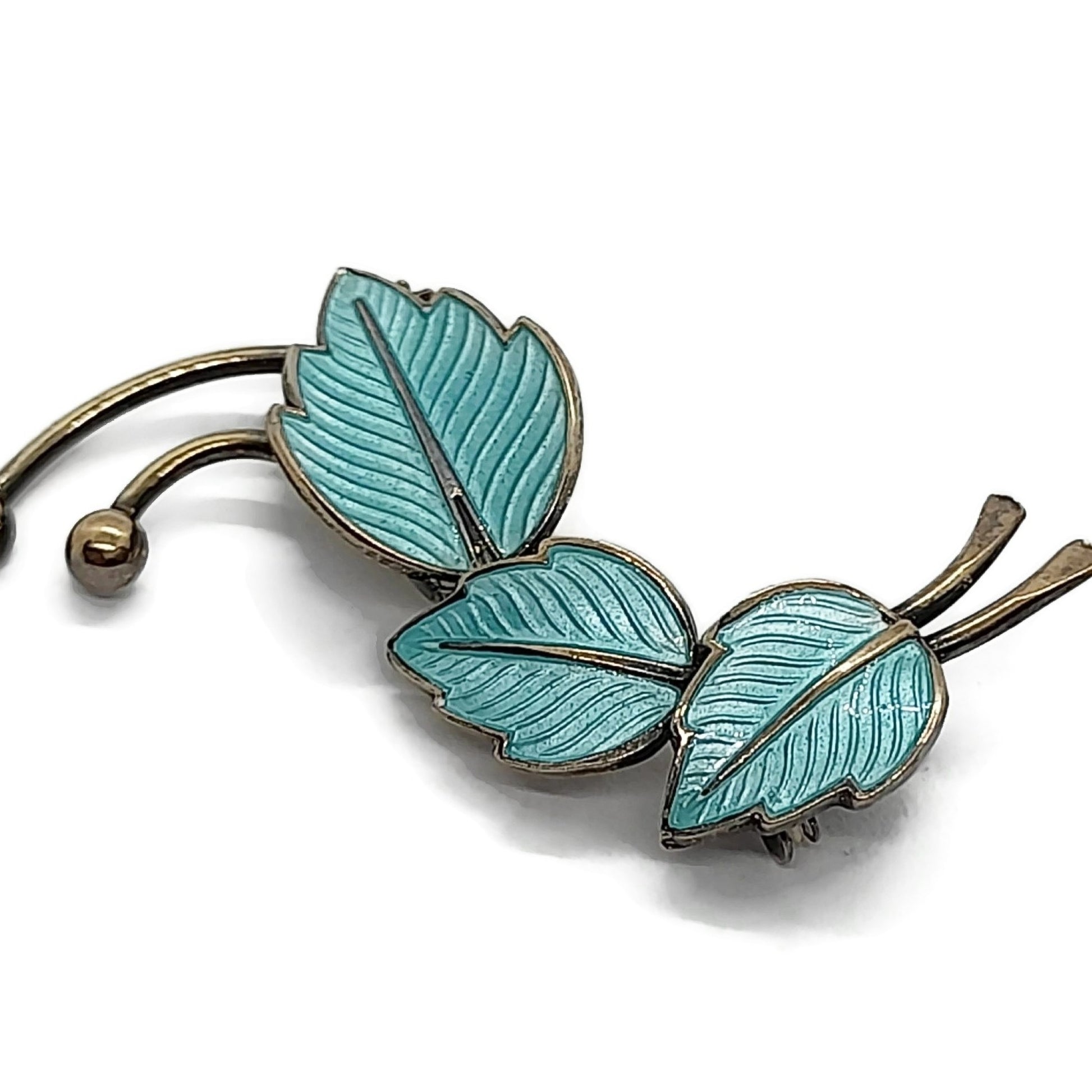 Jemax Denmark turquoise enamel and sterling silver gilt leaf brooch close up