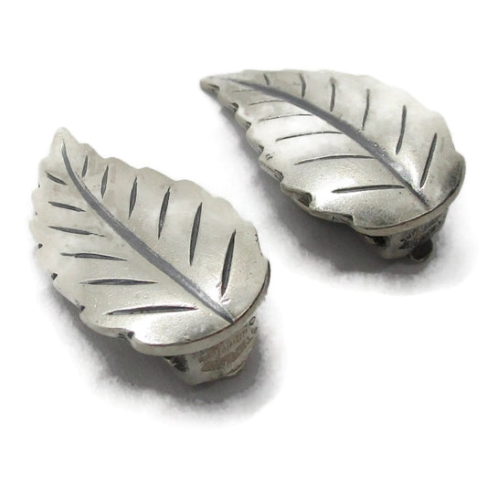 John Lauritzen Denmark sterling silver leaf clip on earrings shown in close up on an angle