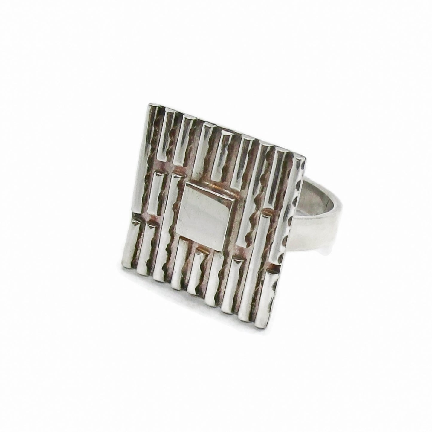 Angle view of square statement sterling silver ring by LED