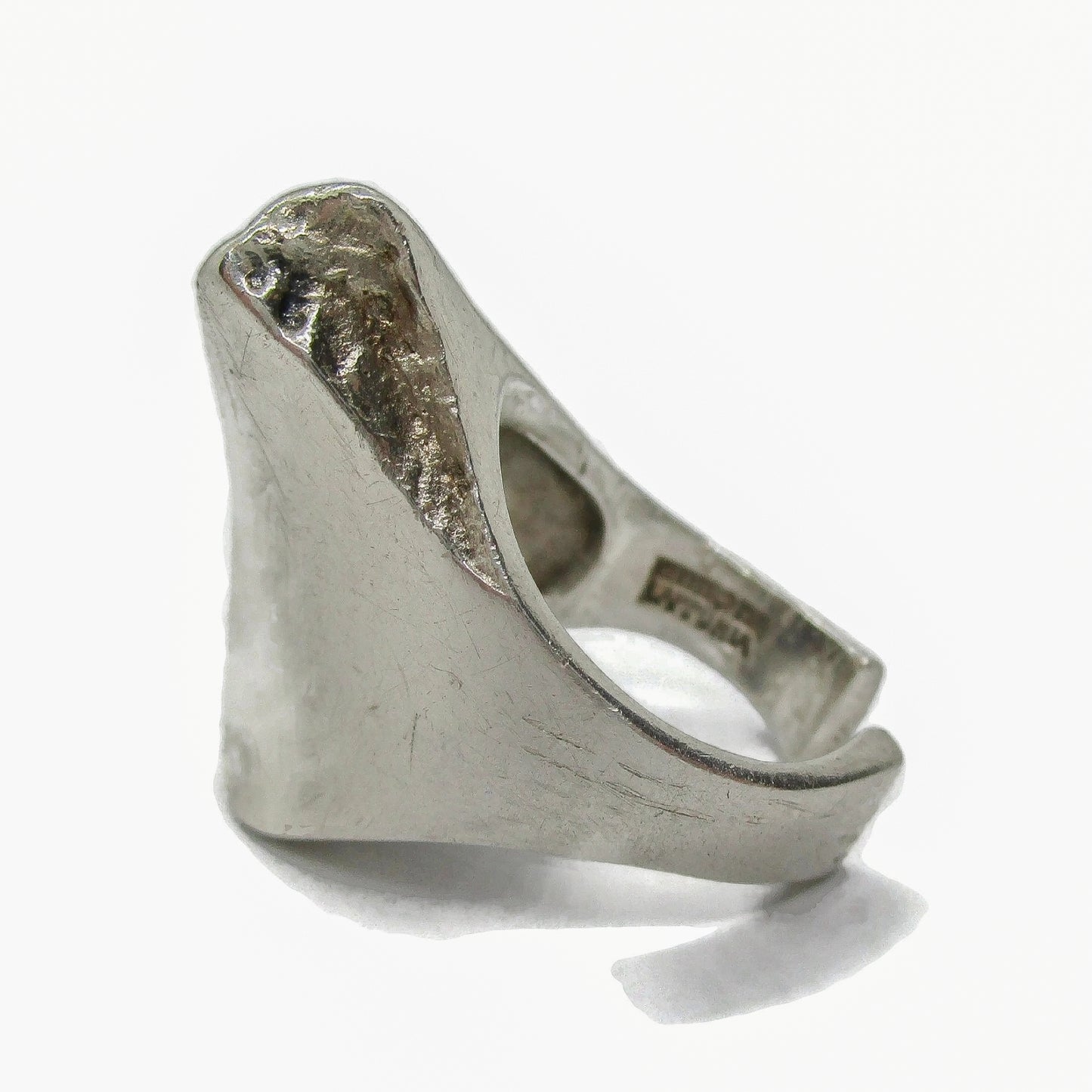 Side view of a Lapponia Finland sterling silver ring in the Balance design