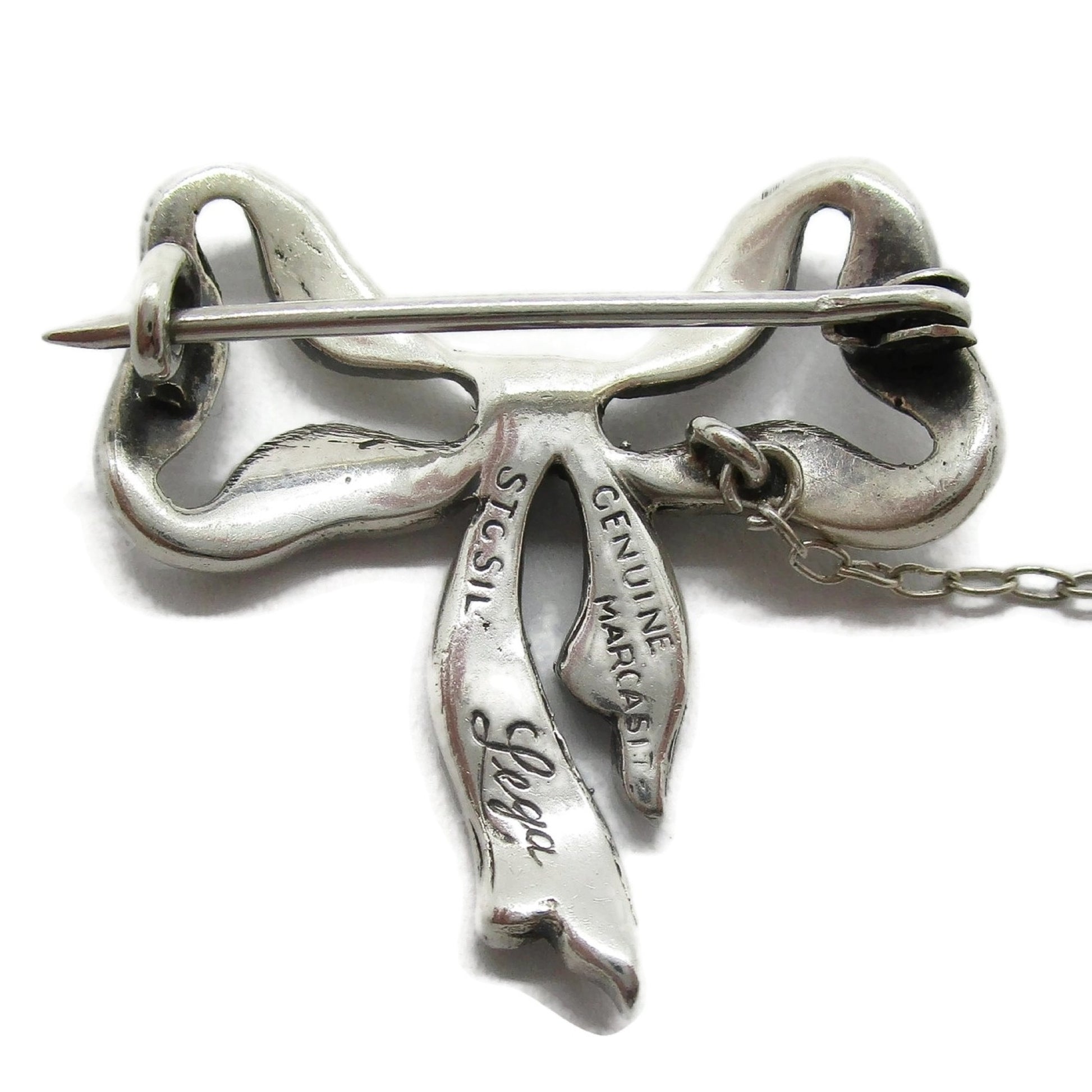 Backview of Lega Australia marcasite and sterling silver bow brooch showing hallmarks