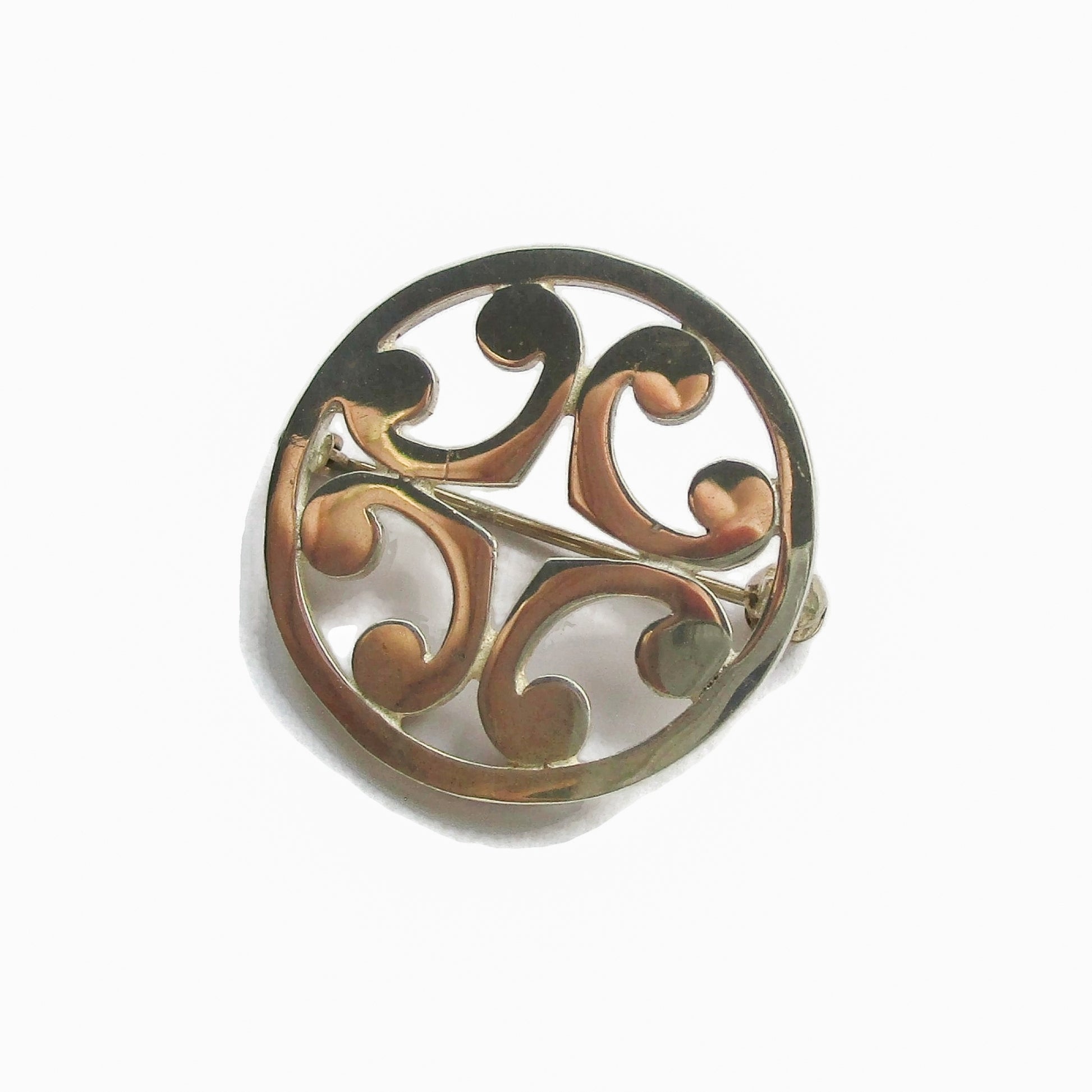 Malcolm Gray sterling silver St Magnus brooch shown on angle