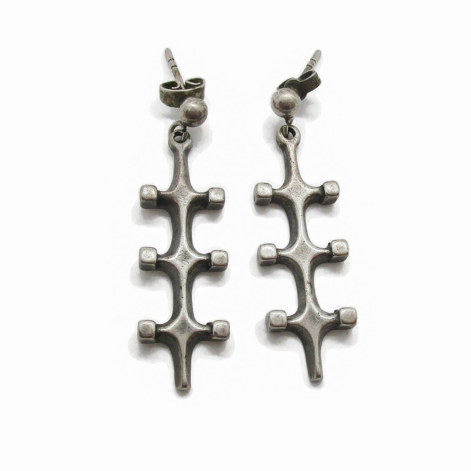 Front view of a pair of Marianne Berg Troll series sterling silver dangle earrings