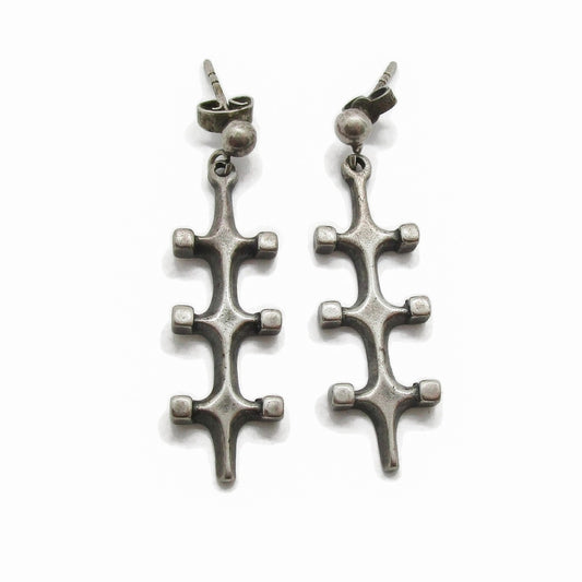 Front view of a pair of Marianne Berg Troll series sterling silver dangle earrings