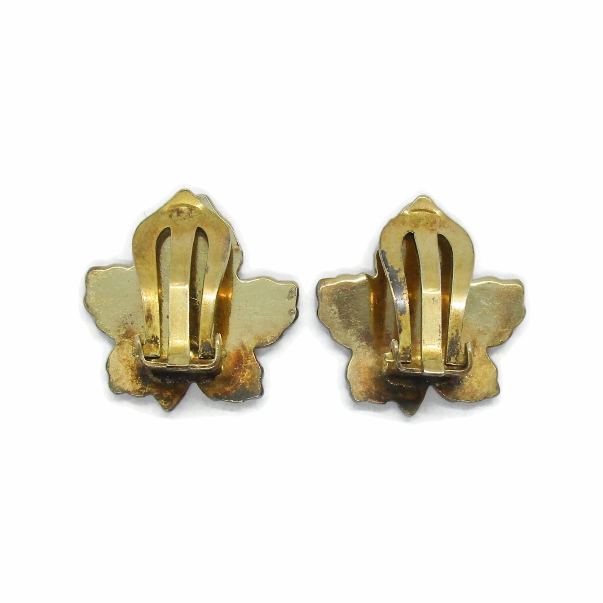 Back view of a pair of Meka Denmark yellow guilloche enamel and sterling silver gilt maple leaf clip on earrings