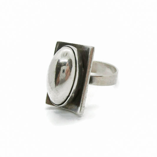Angle view of a Niels Erik From Denmark sterling silver cabochon ring