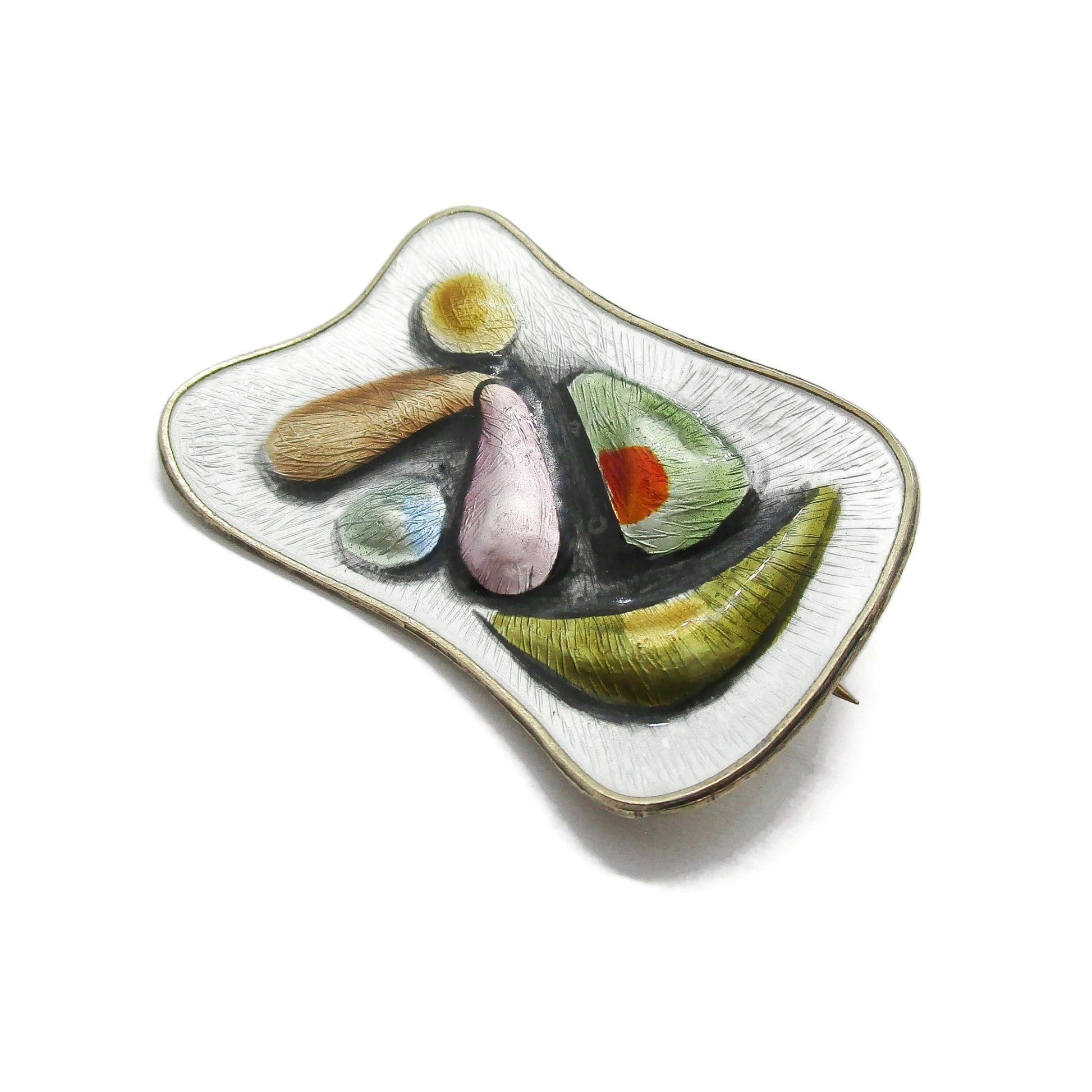 Oystein Balle Norway colourful enamel and sterling silver brooch shown on an angle