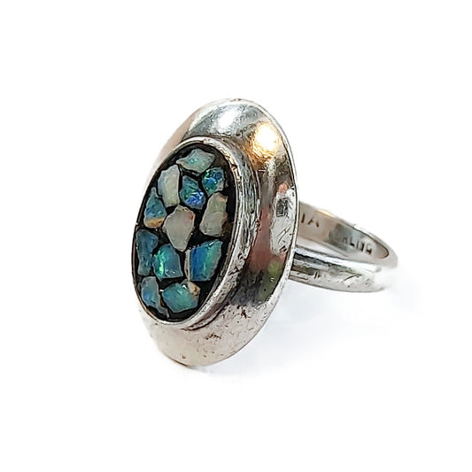 Angled view of a Scandia Australia sterling silver and opal chip ring