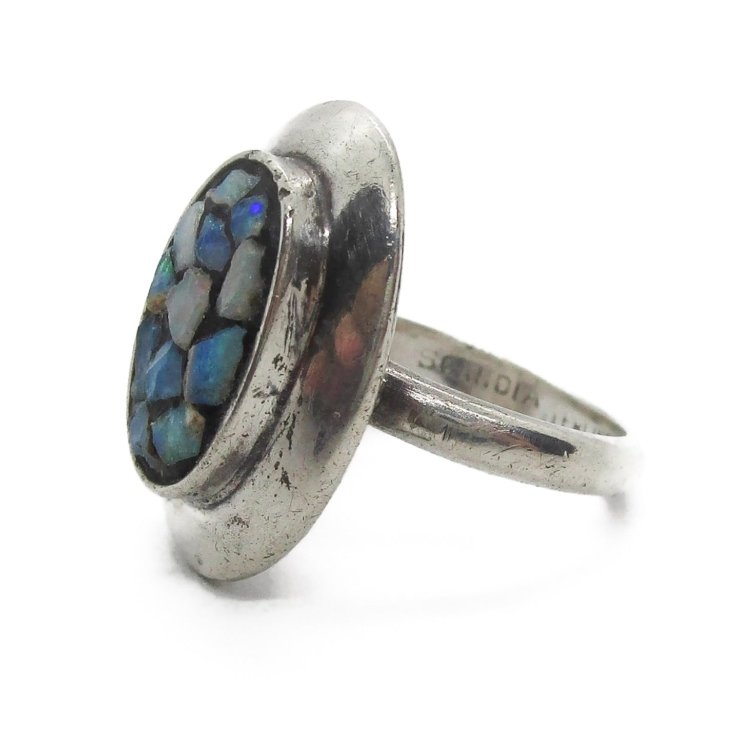 Side view of a Scandia Australia sterling silver and opal chip ring