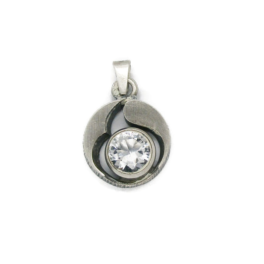Front view of a Karl Laine Finn Feelings small sterling silver and rock crystal pendant