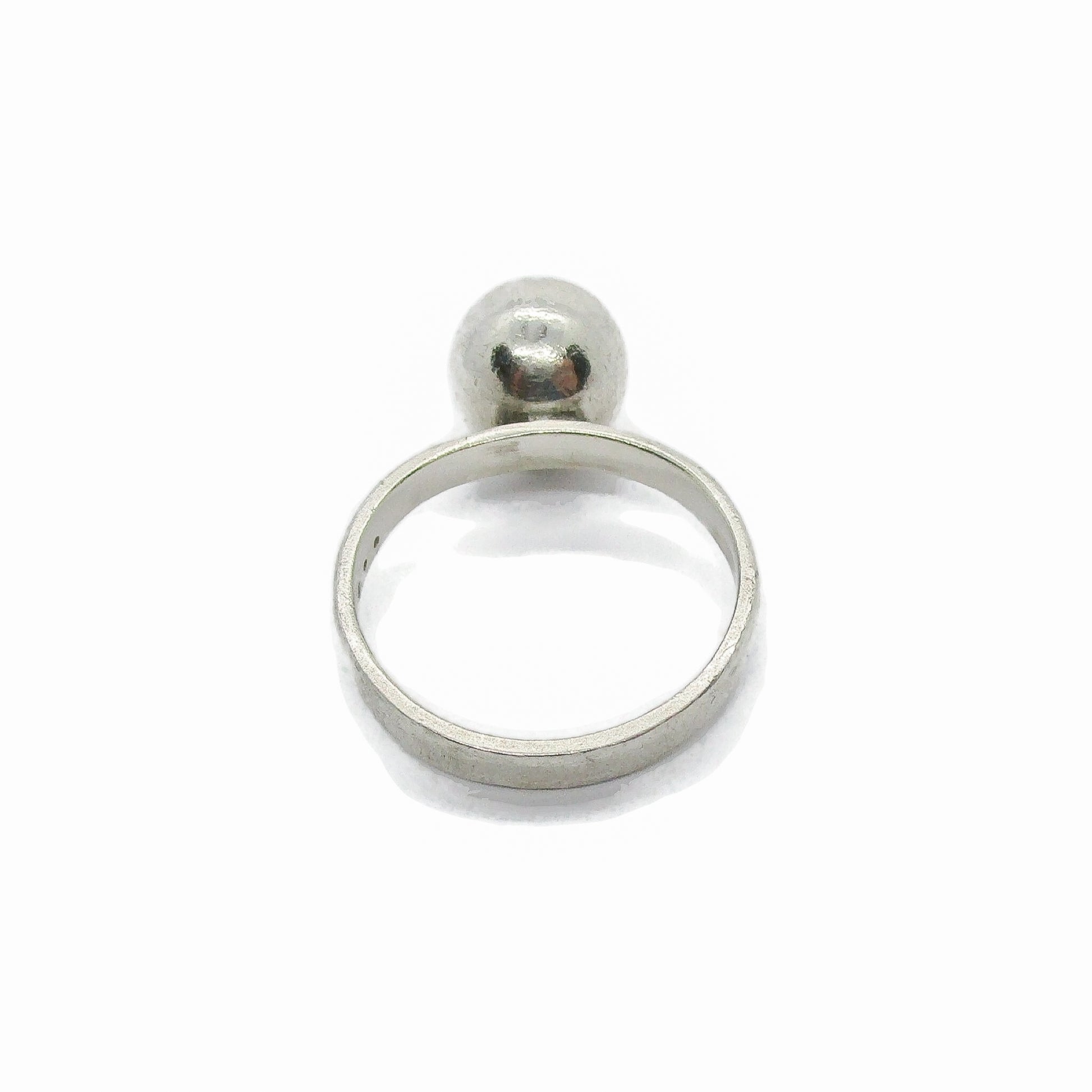 A sterling silver ball ring viewed from above