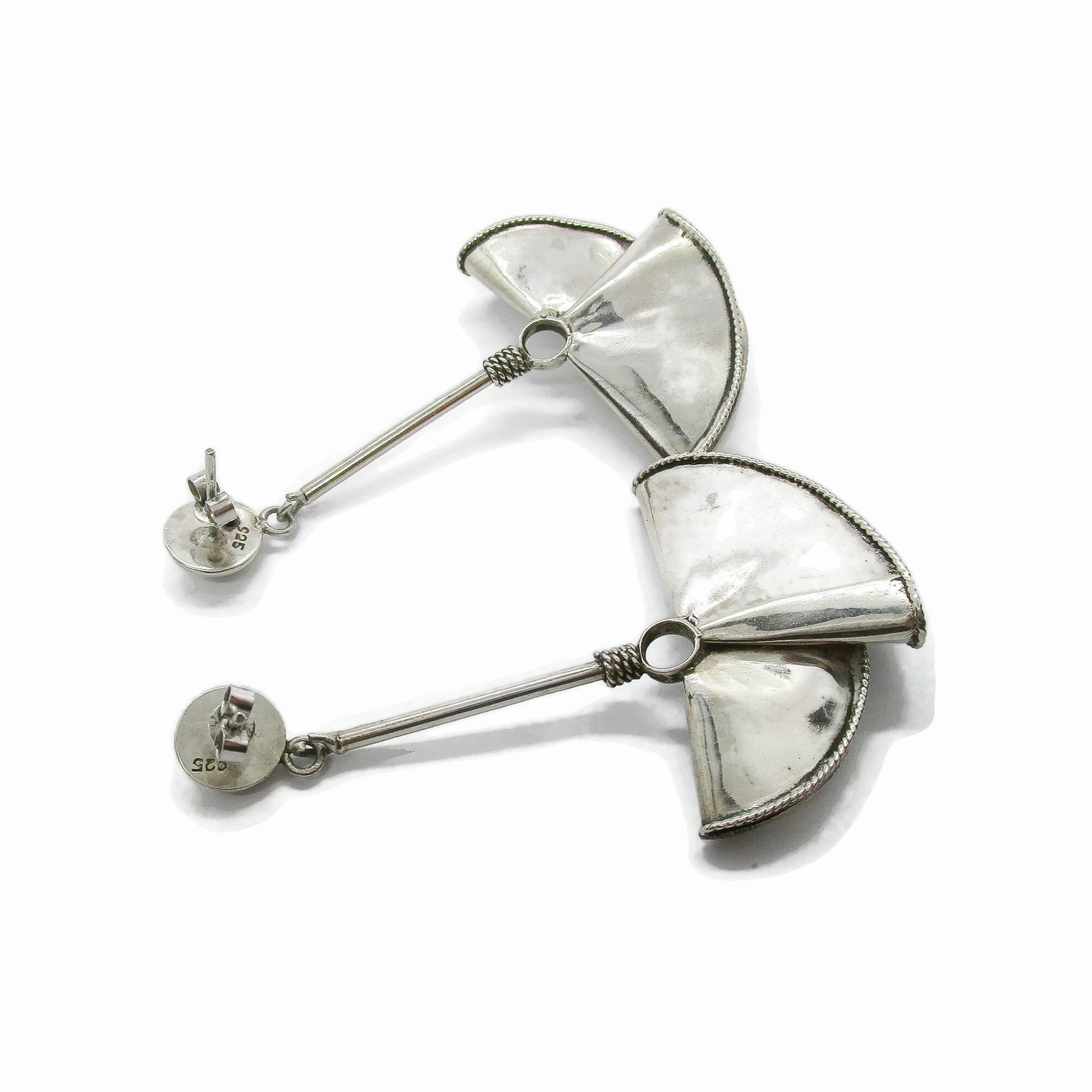 Back view of a pair of large sterling silver fan-shaped earrings for pierced ears