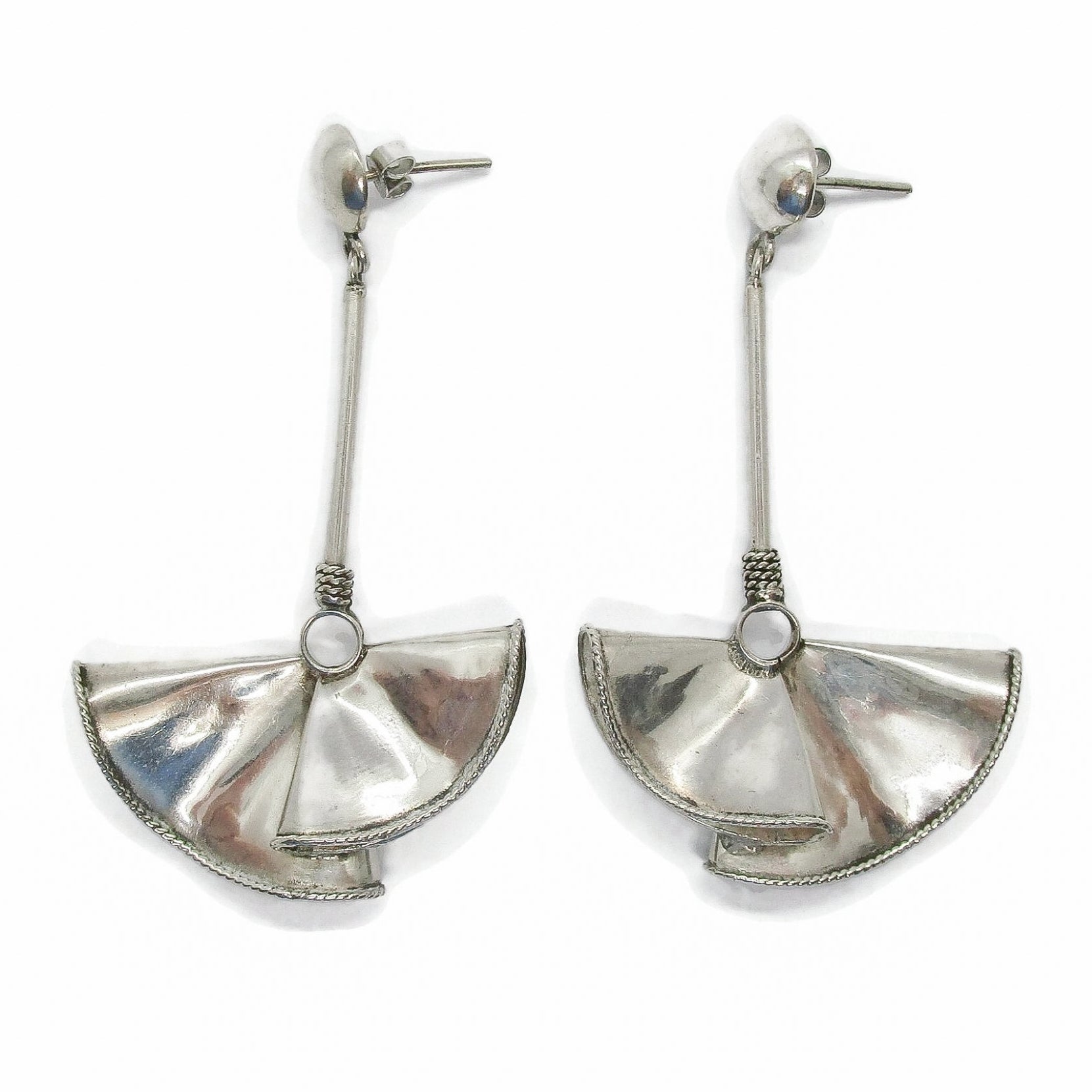 Front view of a pair of large sterling silver fan-shaped earrings for pierced ears